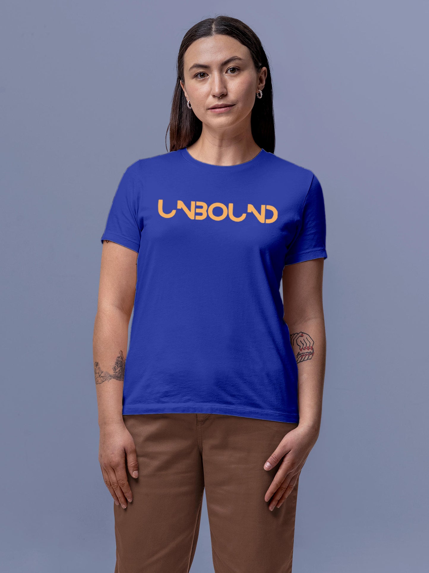 Model wearing Women's Blue Round Neck T-shirt with 'Unbound' design, offering effortless style and premium comfort