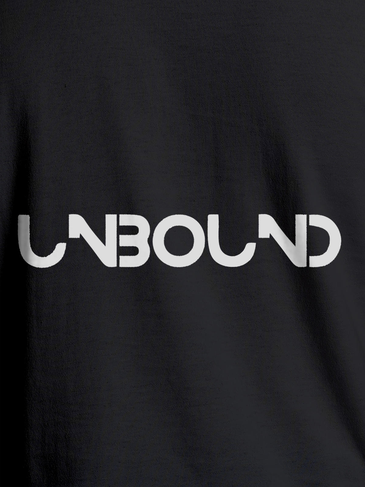 Close up of 'Unbound' design on Men's Dark Grey Round Neck T-shirt, highlighting intricate details and vibrant print.