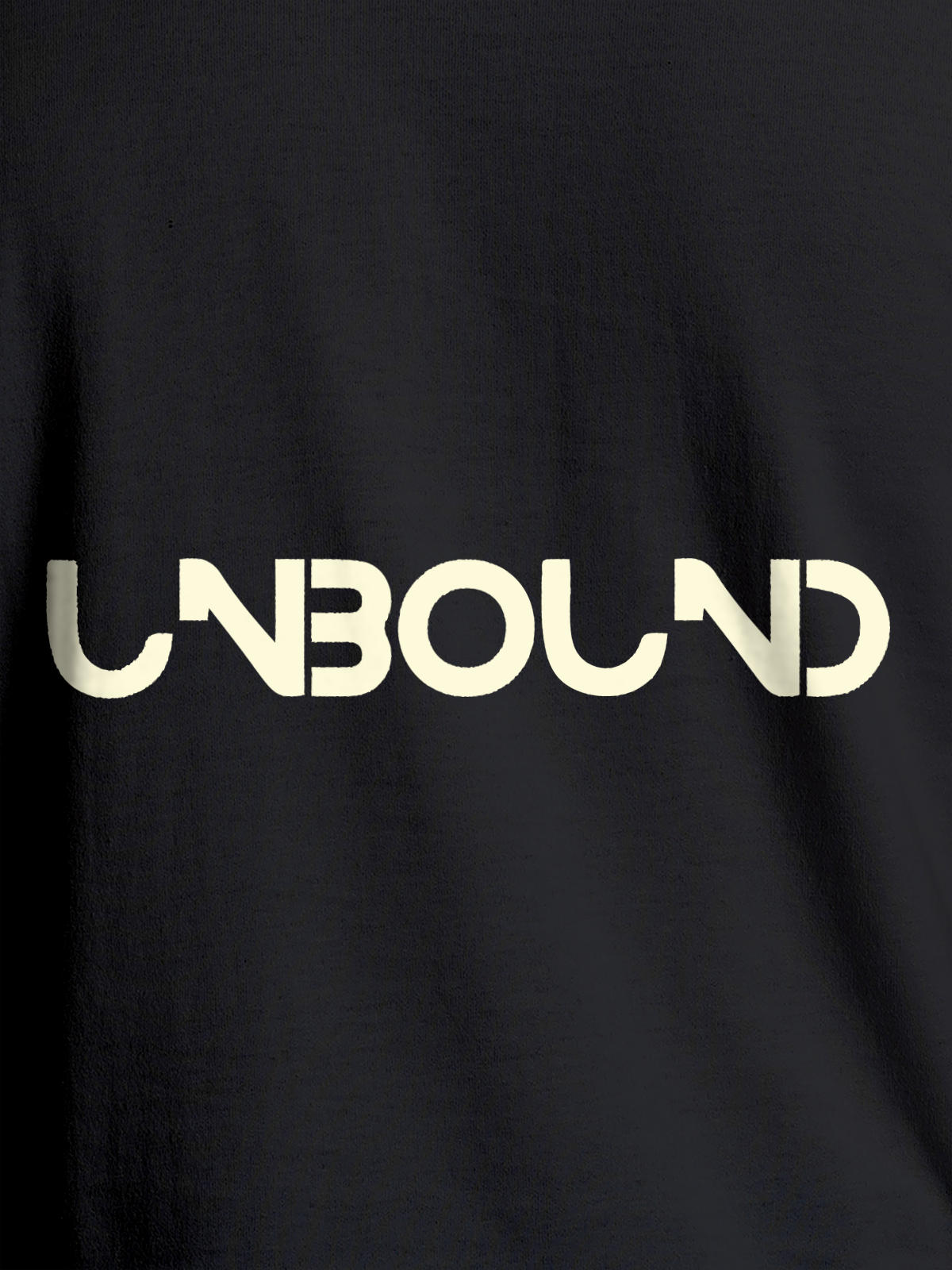 Close up of 'Unbound' design on Men's Dark Grey Round Neck T-shirt, highlighting intricate details and vibrant print.