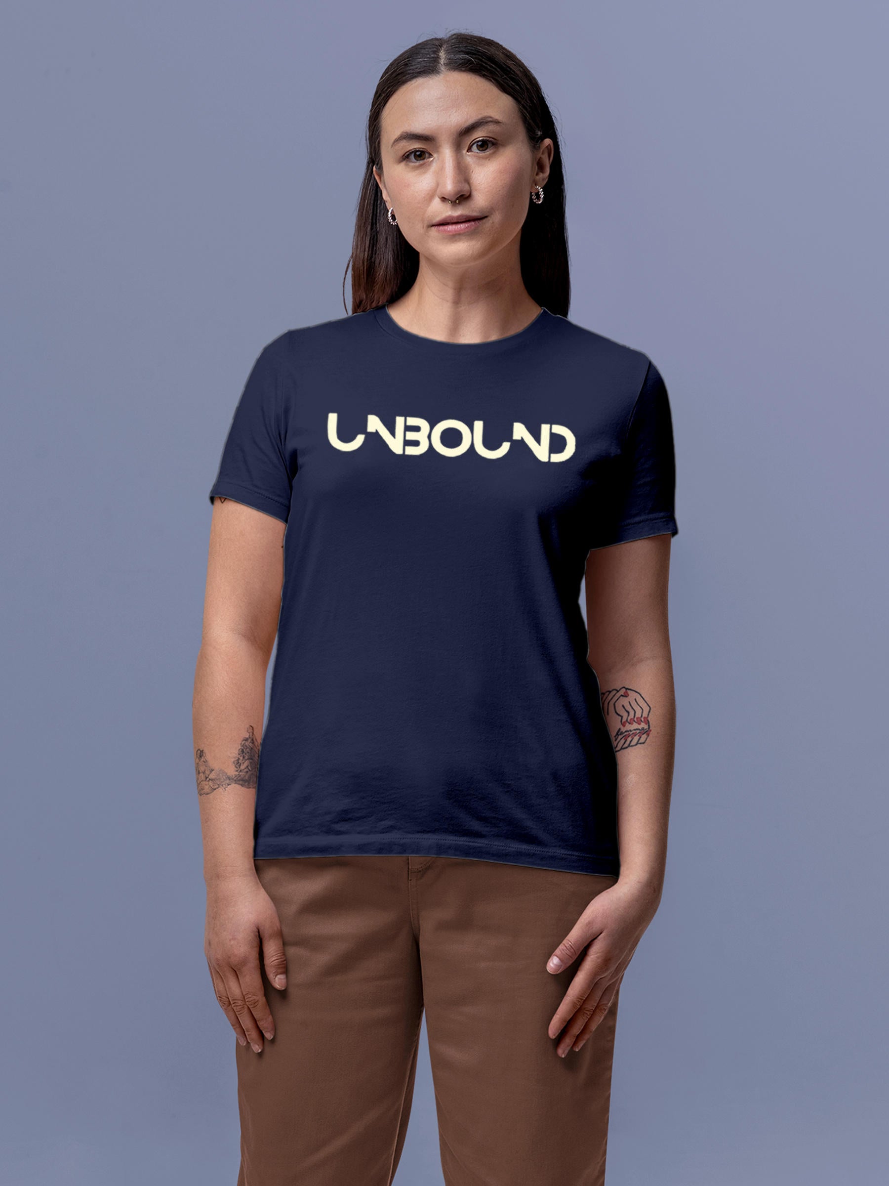 Model wearing Women's Navy Blue Round Neck T-shirt with 'Unbound' design, offering effortless style and premium comfort