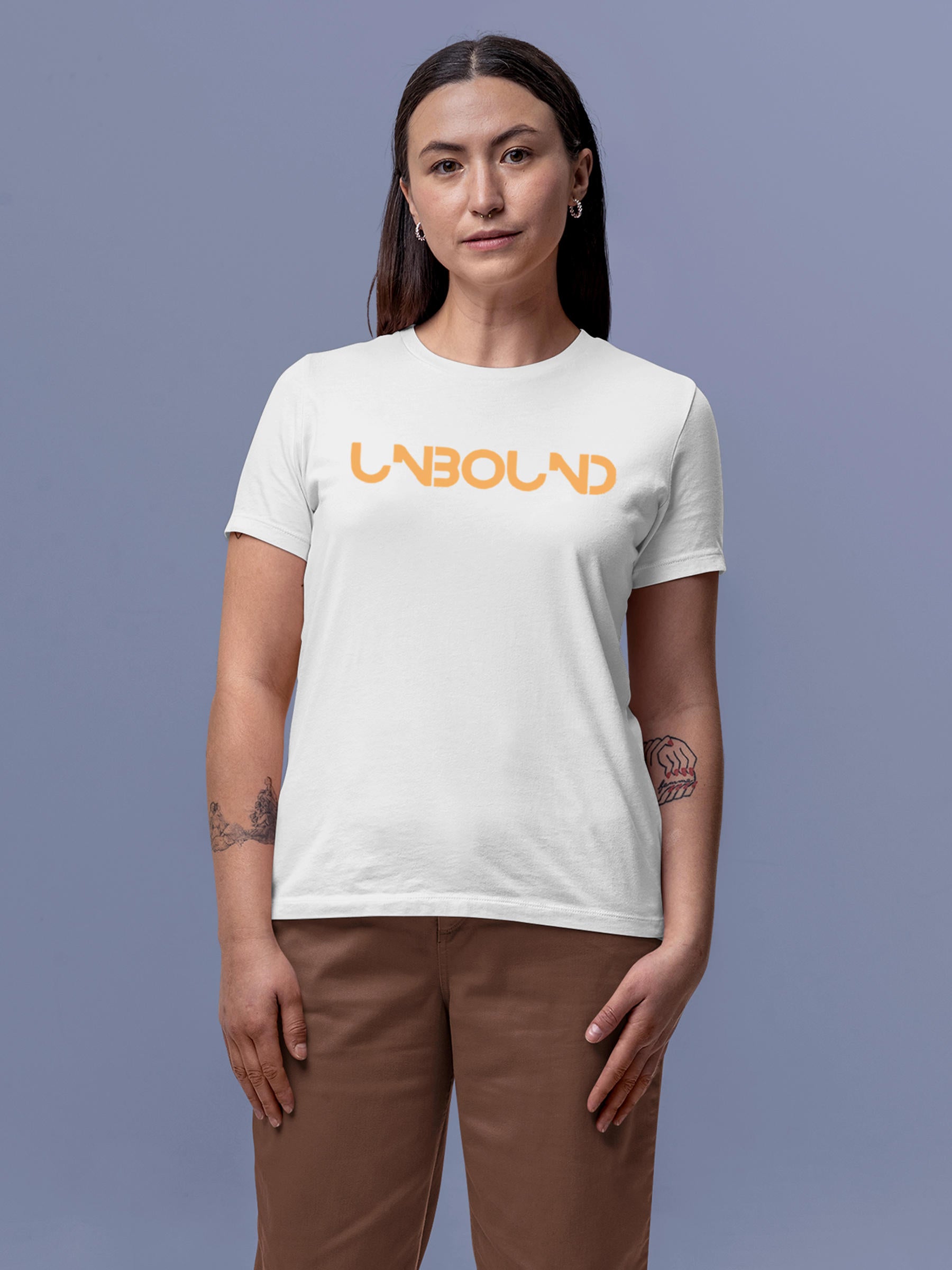 Model wearing Women's White Round Neck T-shirt with 'Unbound' design, offering effortless style and premium comfort