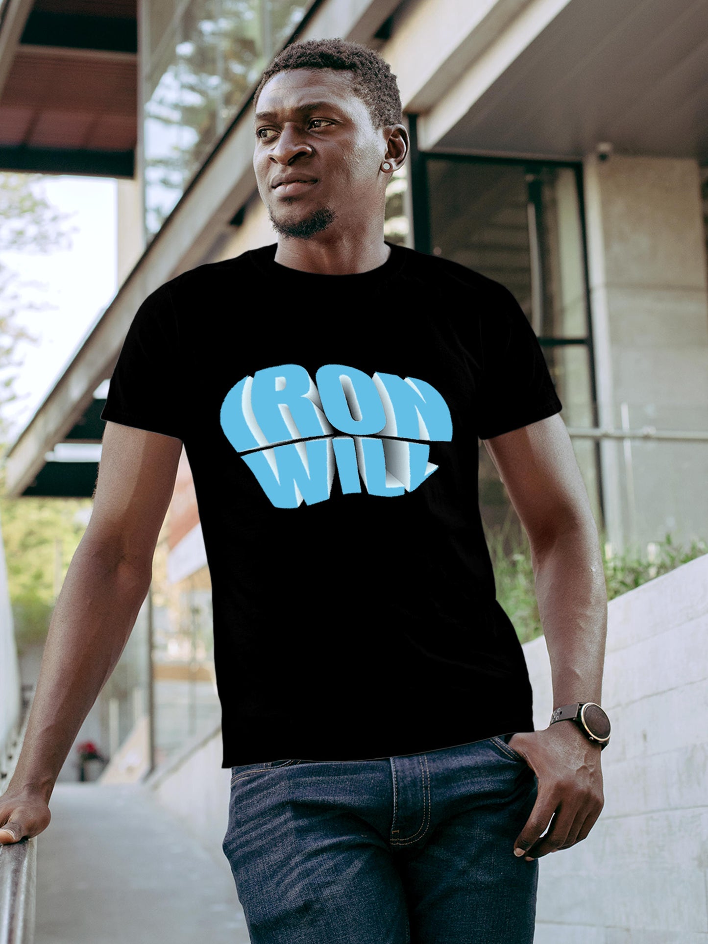 Model wearing Men's Black Round Neck T-shirt with 'Iron Will' design, offering effortless style and premium comfort