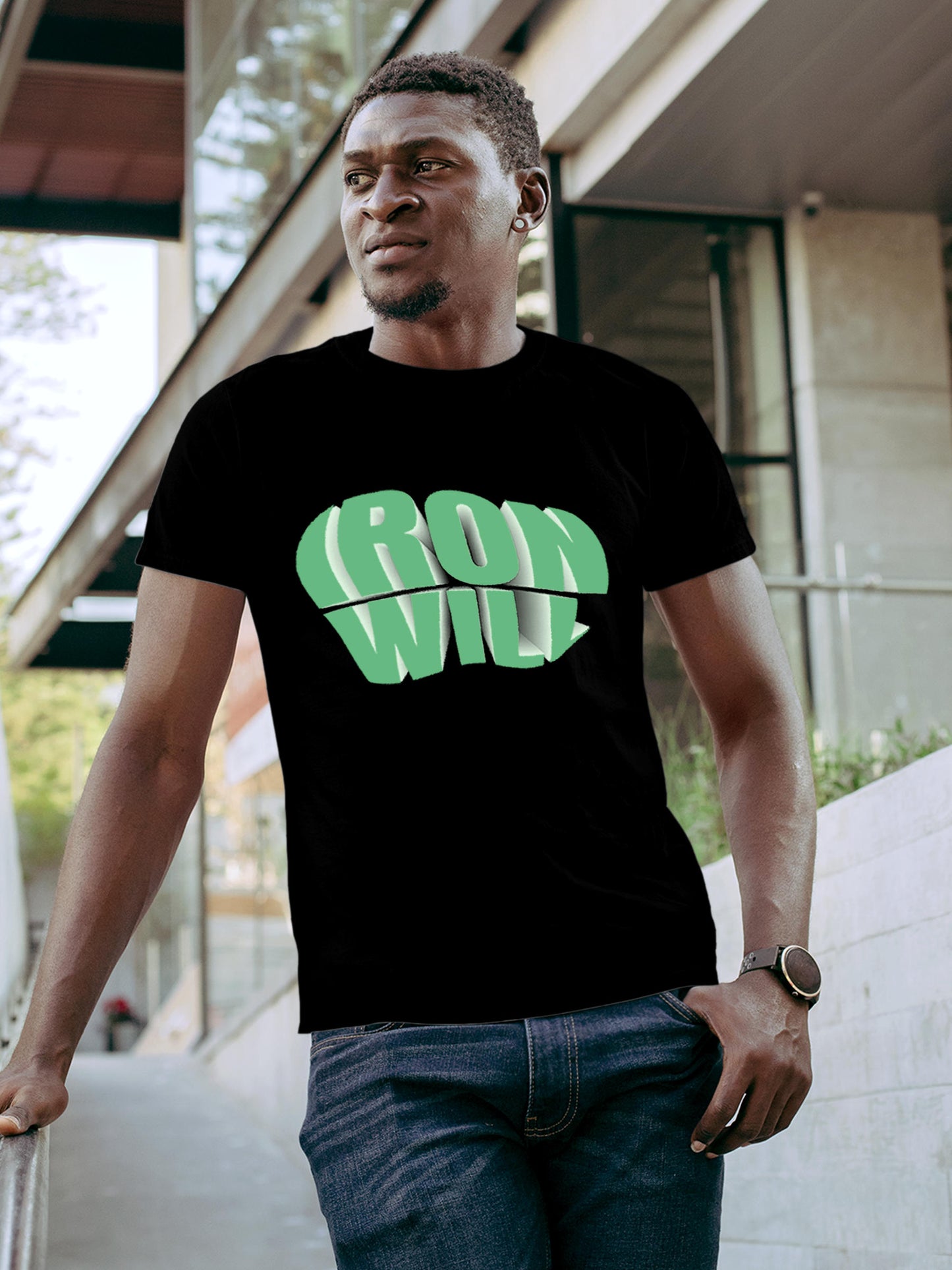 Model wearing Men's Black Round Neck T-shirt with 'Iron Will' design, offering effortless style and premium comfort