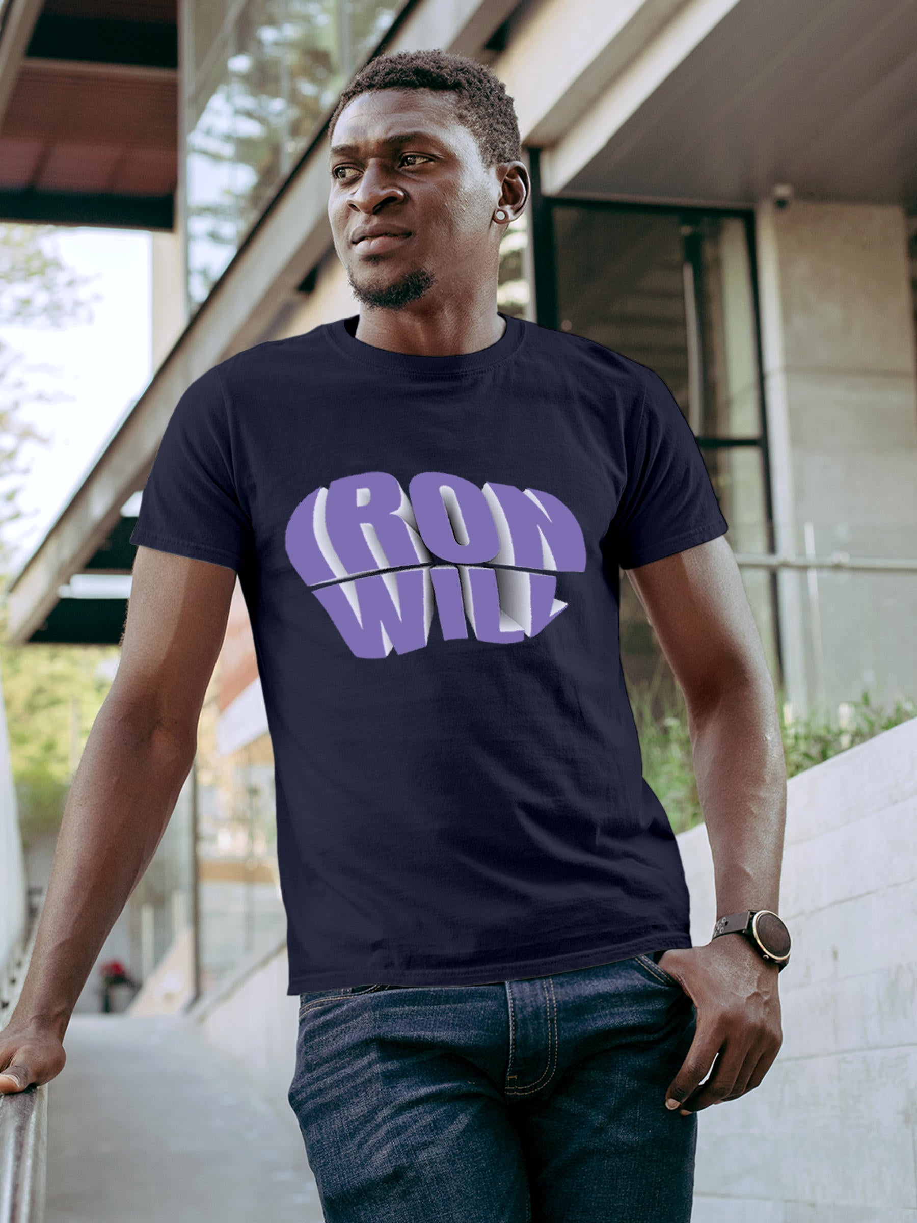 Model wearing Men's Navy Blue Round Neck T-shirt with 'Iron Will' design, offering effortless style and premium comfort