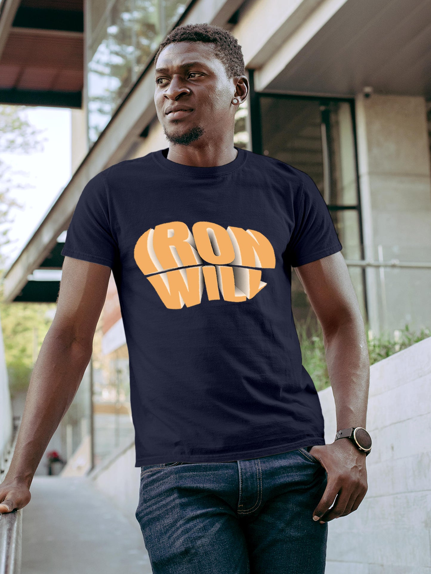 Model wearing Men's Navy Blue Round Neck T-shirt with 'Iron Will' design, offering effortless style and premium comfort