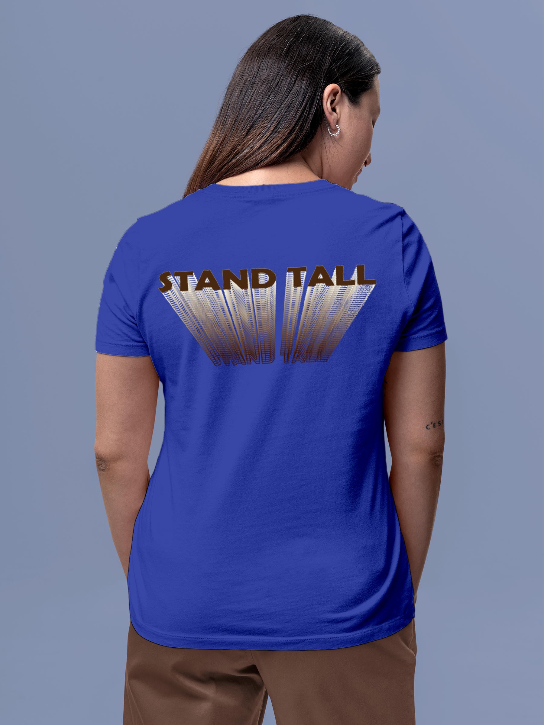 Model wearing Women's Blue Round Neck T-shirt with 'Stand Tall' design, offering effortless style and premium comfort