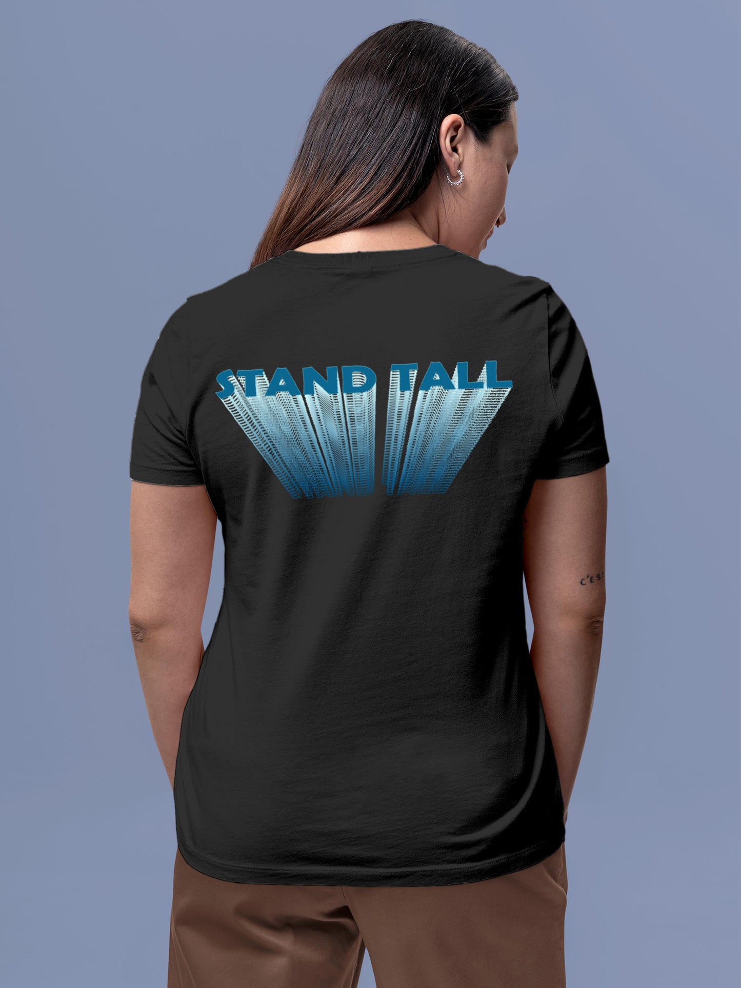 Model wearing Women's Dark Grey Round Neck T-shirt with 'Stand Tall' design, offering effortless style and premium comfort