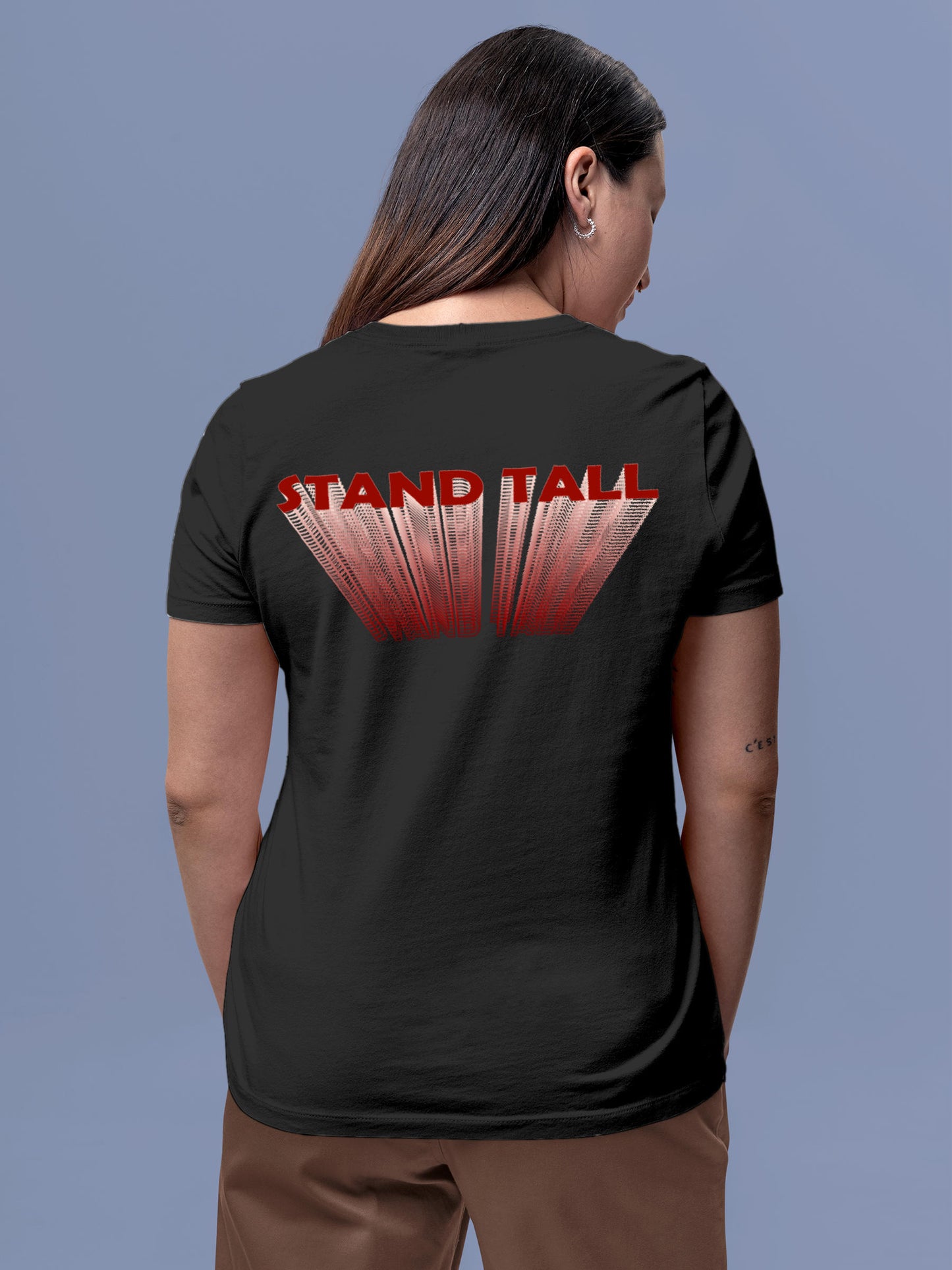 Model wearing Women's Dark Grey Round Neck T-shirt with 'Stand Tall' design, offering effortless style and premium comfort