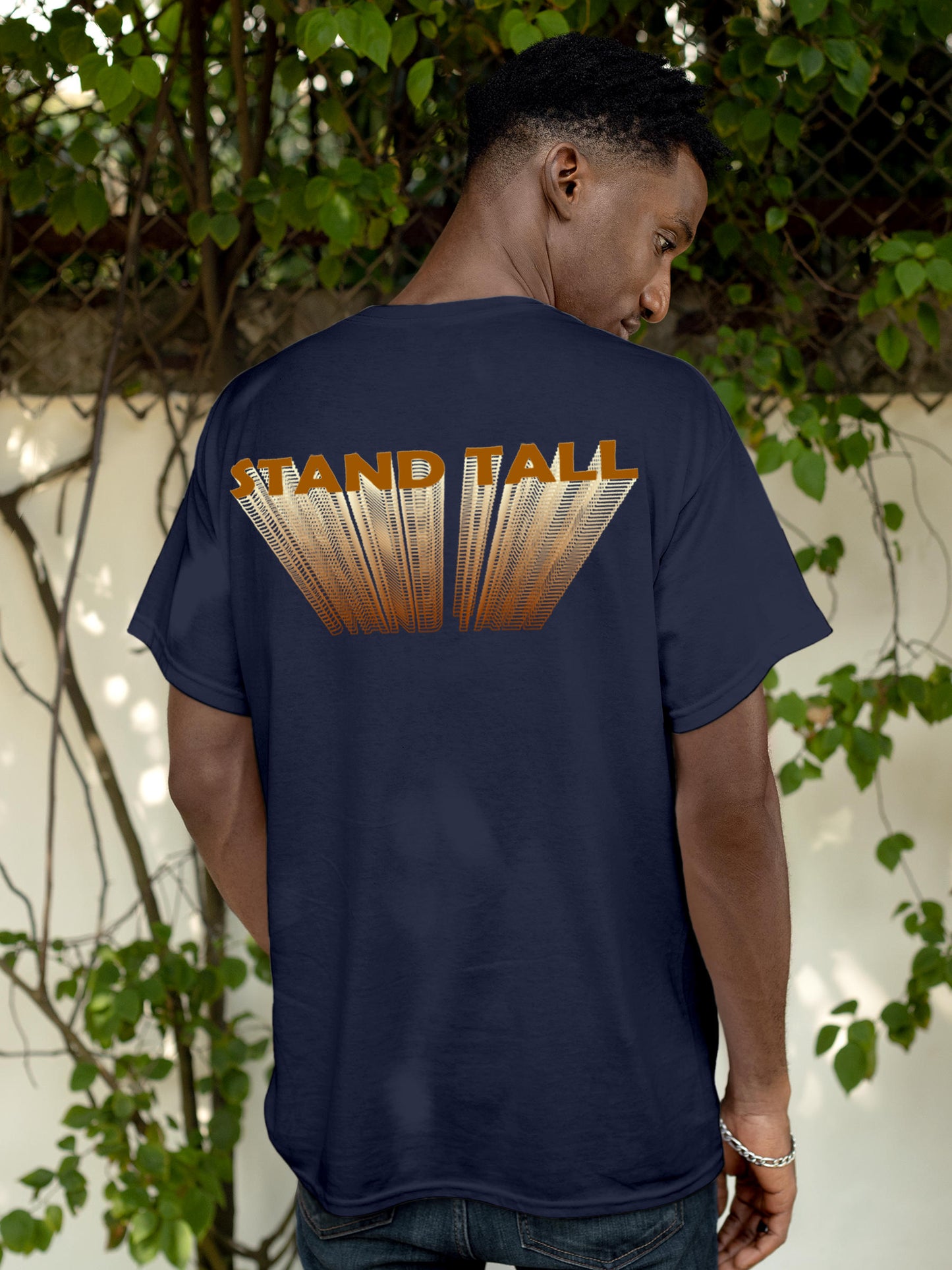 Model wearing Men's Navy Blue Round Neck T-shirt with 'Stand Tall' design, offering effortless style and premium comfort