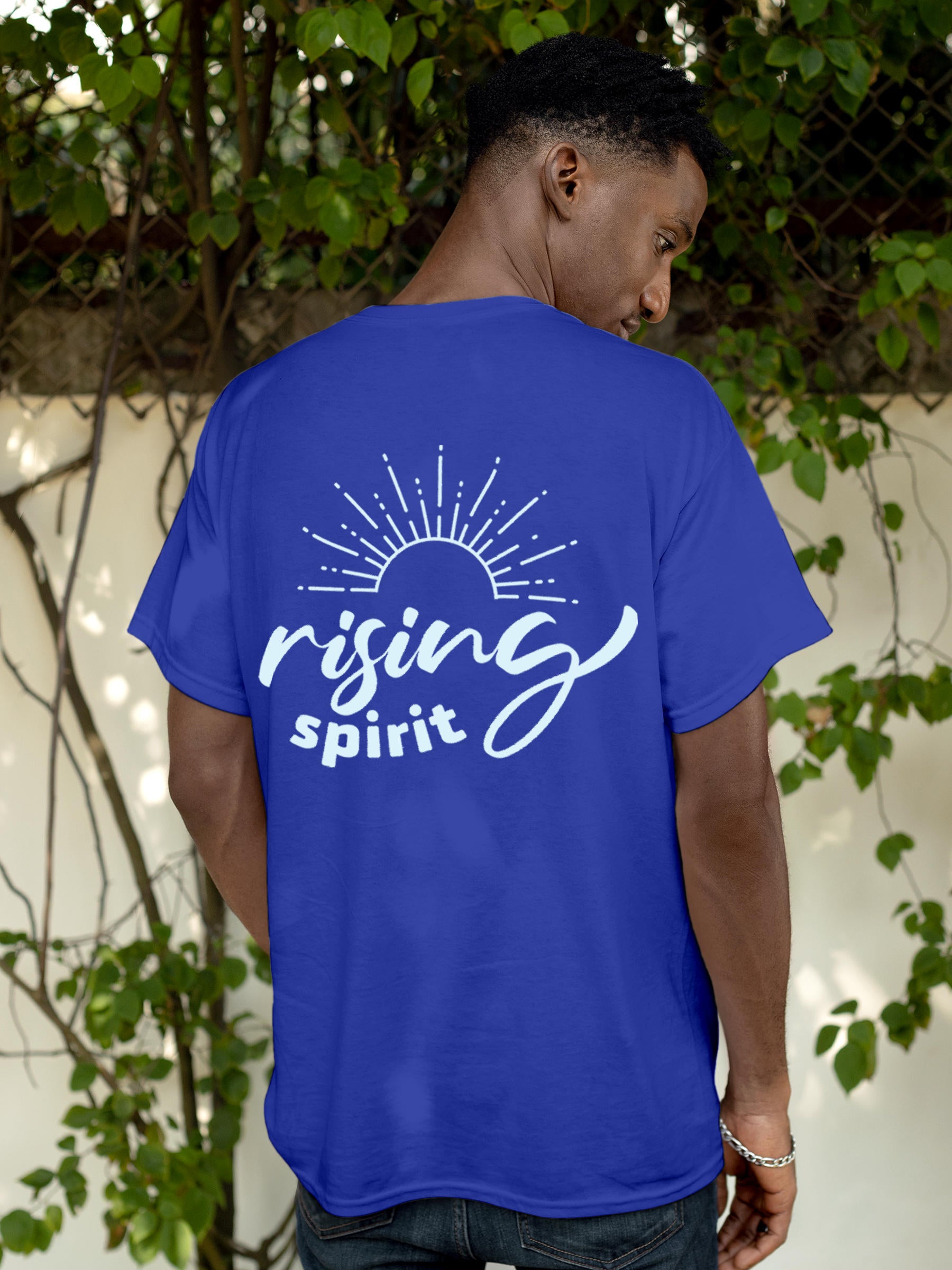 Model wearing Men's Blue Round Neck T-shirt with 'Rising Spirit' design, offering effortless style and premium comfort