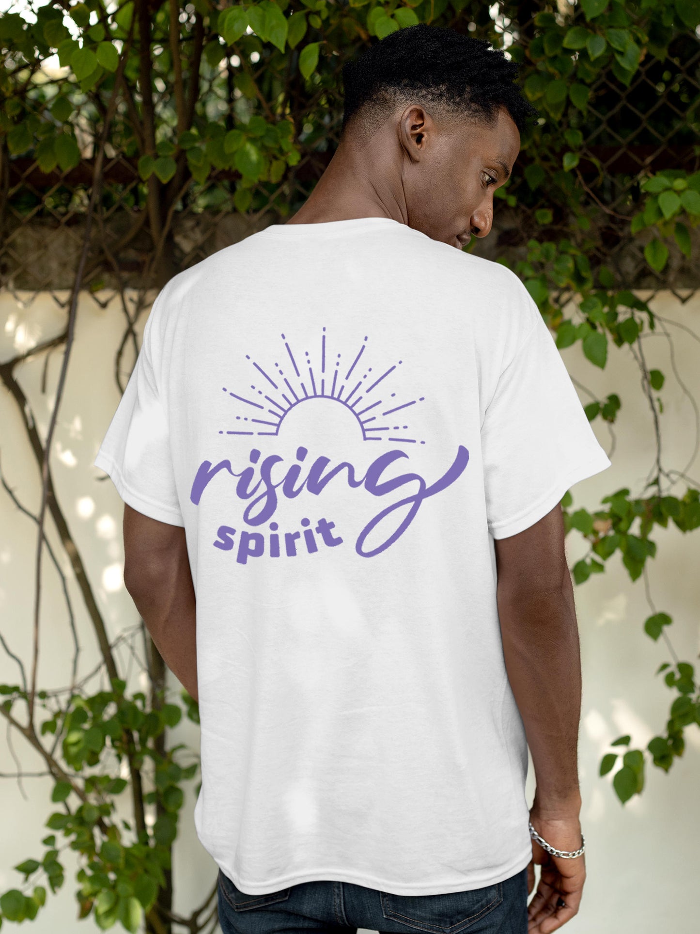 Model wearing Men's White Round Neck T-shirt with 'Rising Spirit' design, offering effortless style and premium comfort
