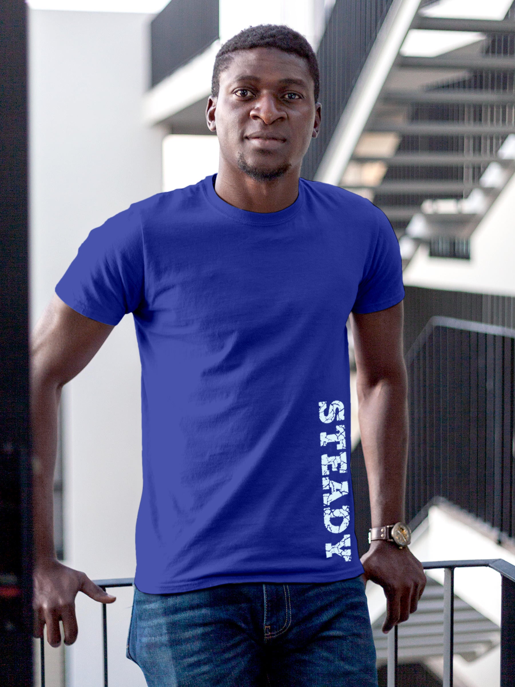 Model wearing Men's Blue Round Neck T-shirt with 'Steady' design, offering effortless style and premium comfort