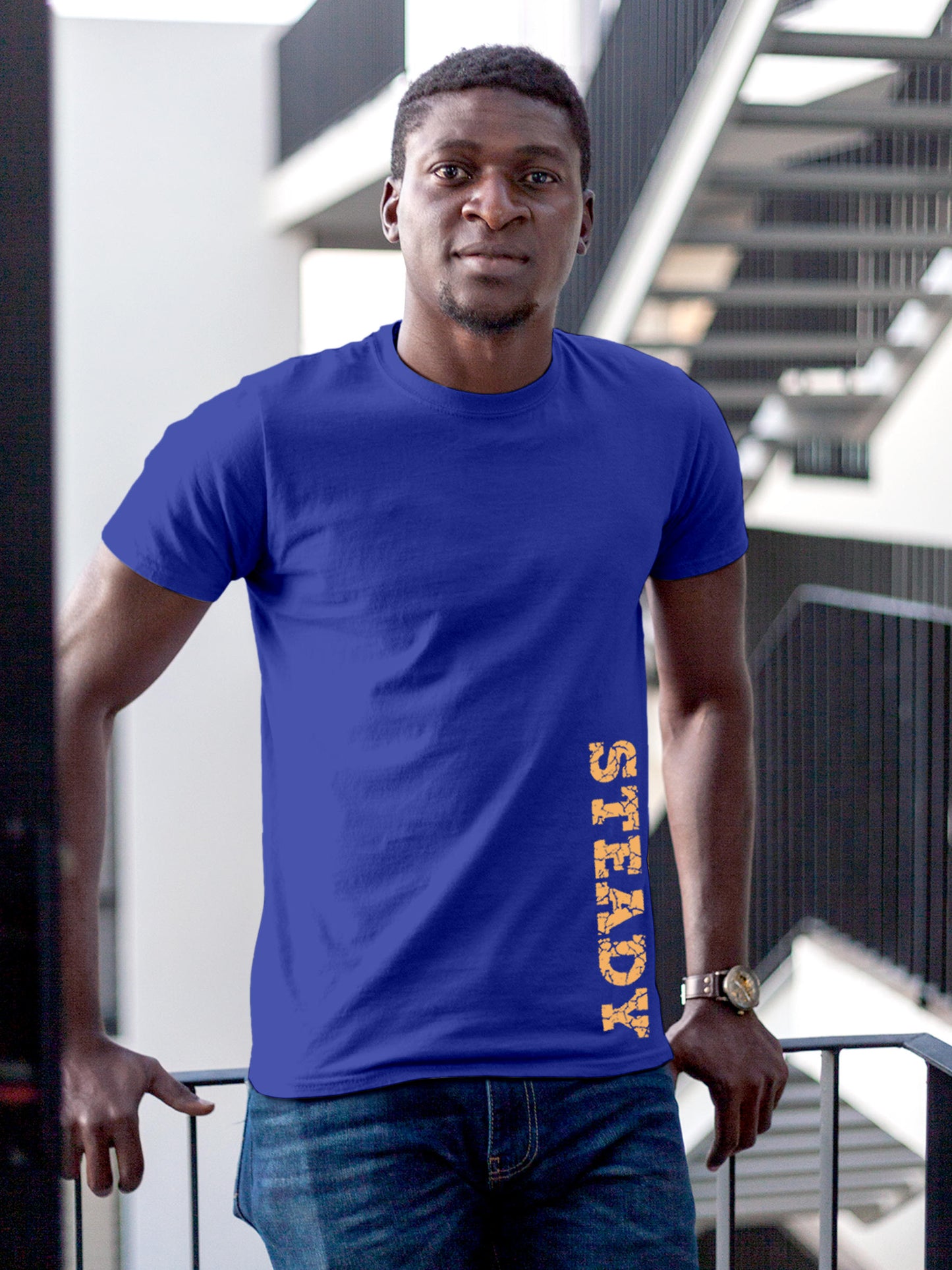 Model wearing Men's Blue Round Neck T-shirt with 'Steady' design, offering effortless style and premium comfort