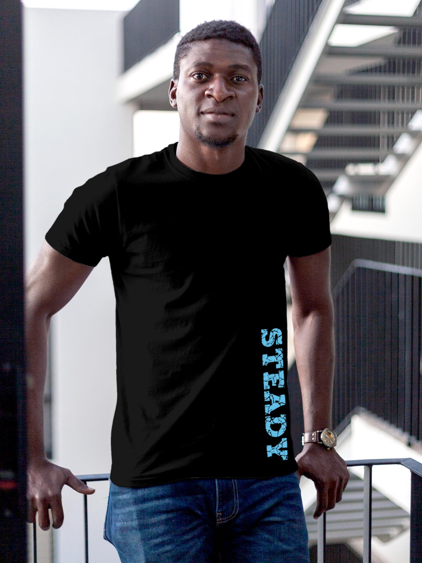Model wearing Men's Black Round Neck T-shirt with 'Steady' design, offering effortless style and premium comfort