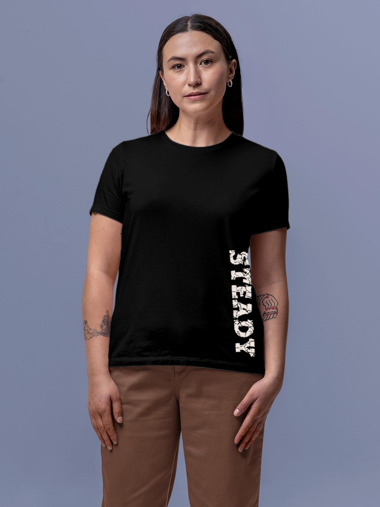 Model wearing Women's Black Round Neck T-shirt with 'Steady' design, offering effortless style and premium comfort