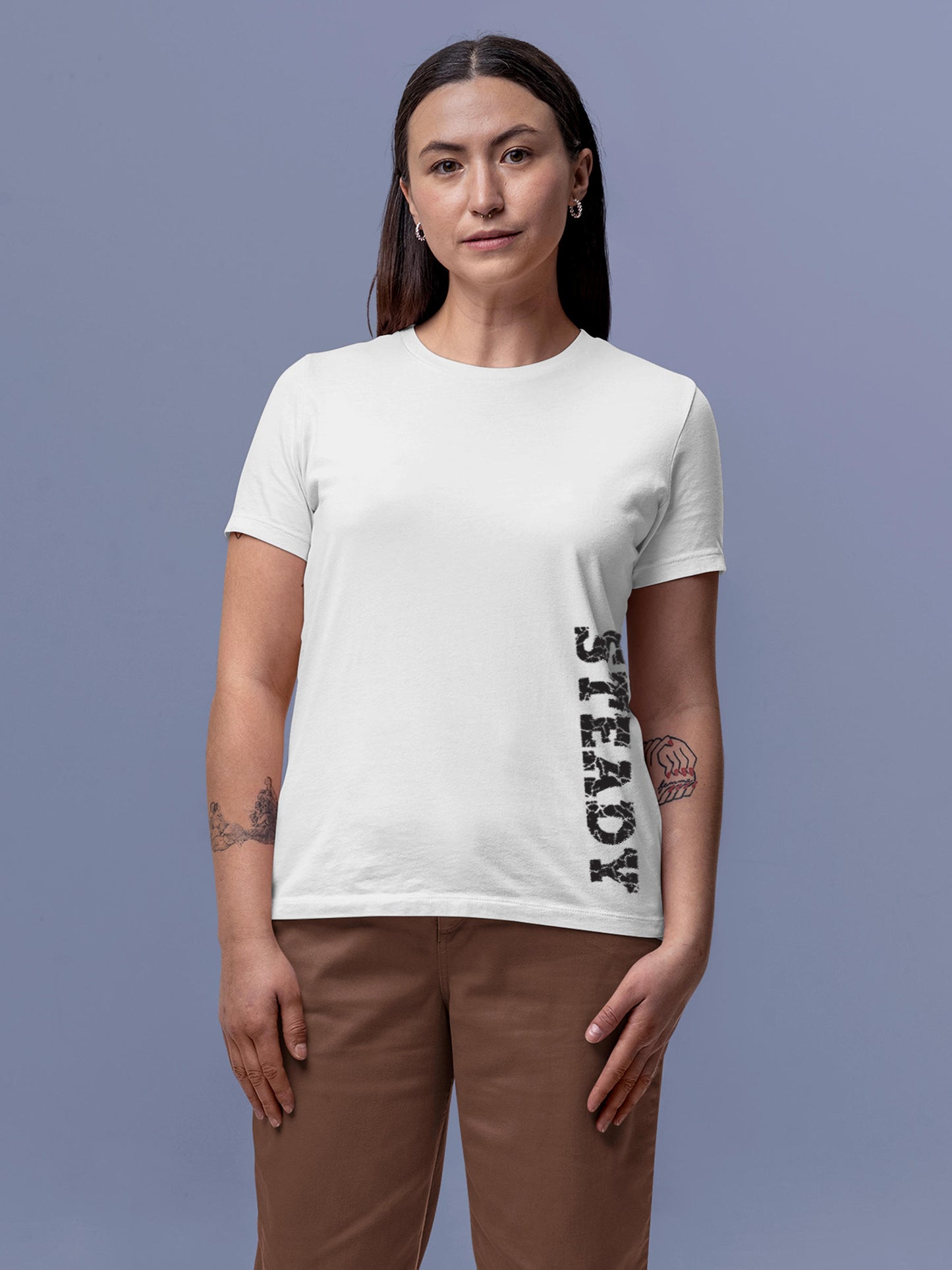 Model wearing Women's White Round Neck T-shirt with 'Steady' design, offering effortless style and premium comfort