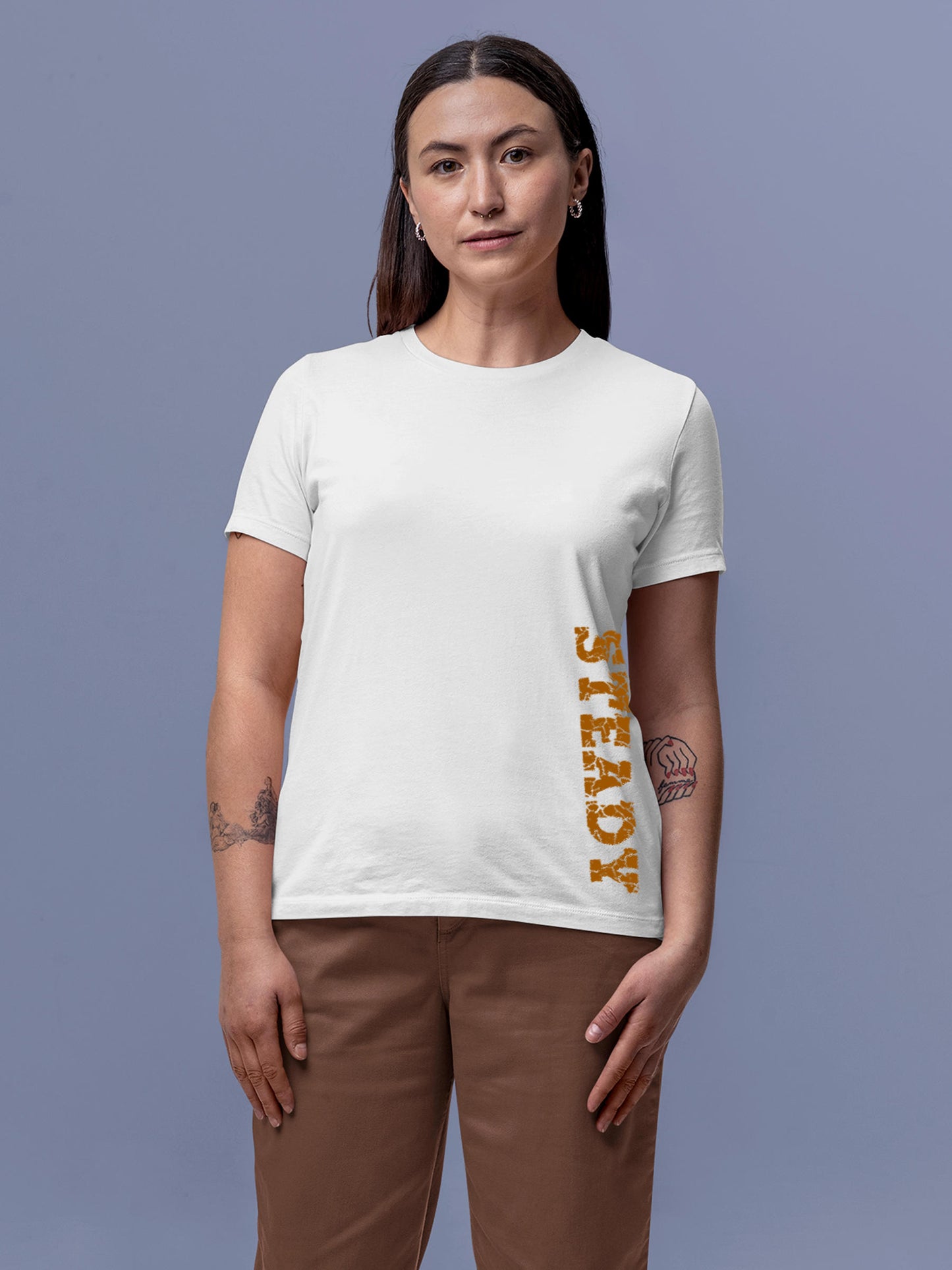 Model wearing Women's White Round Neck T-shirt with 'Steady' design, offering effortless style and premium comfort