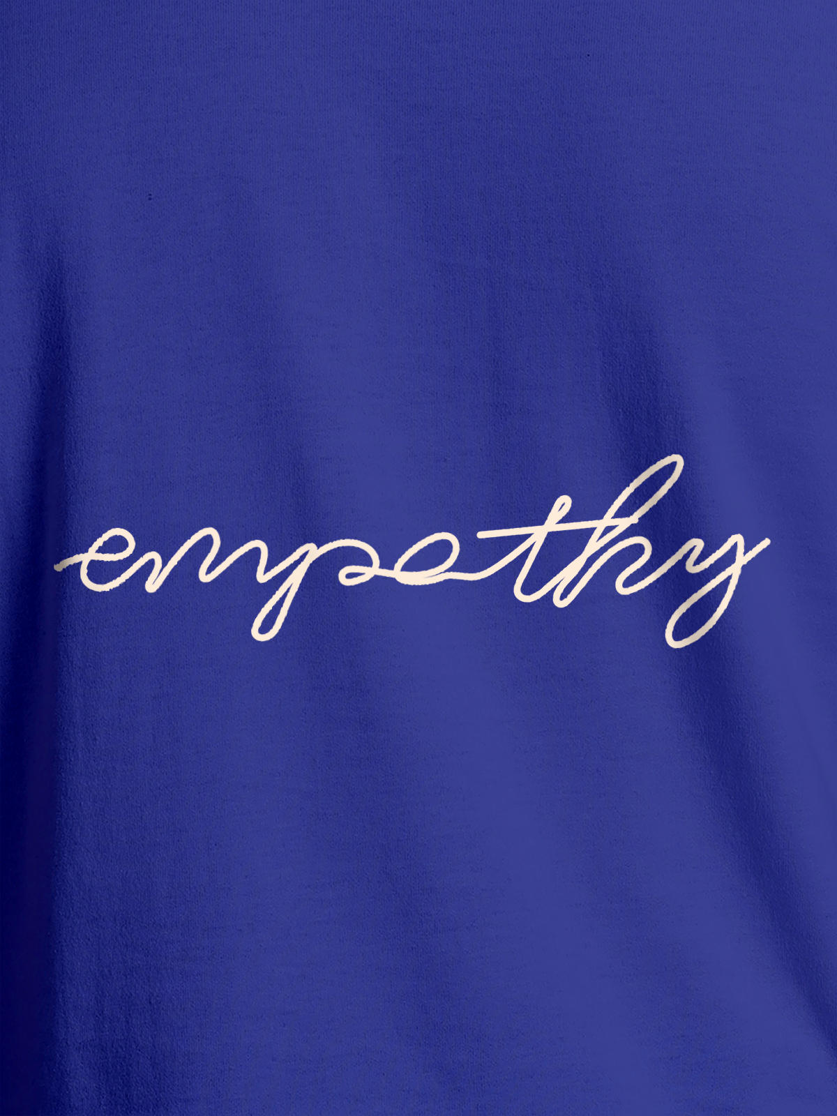 Close up of 'Empathy' design on Women's Blue Round Neck T-shirt, highlighting intricate details and vibrant print.