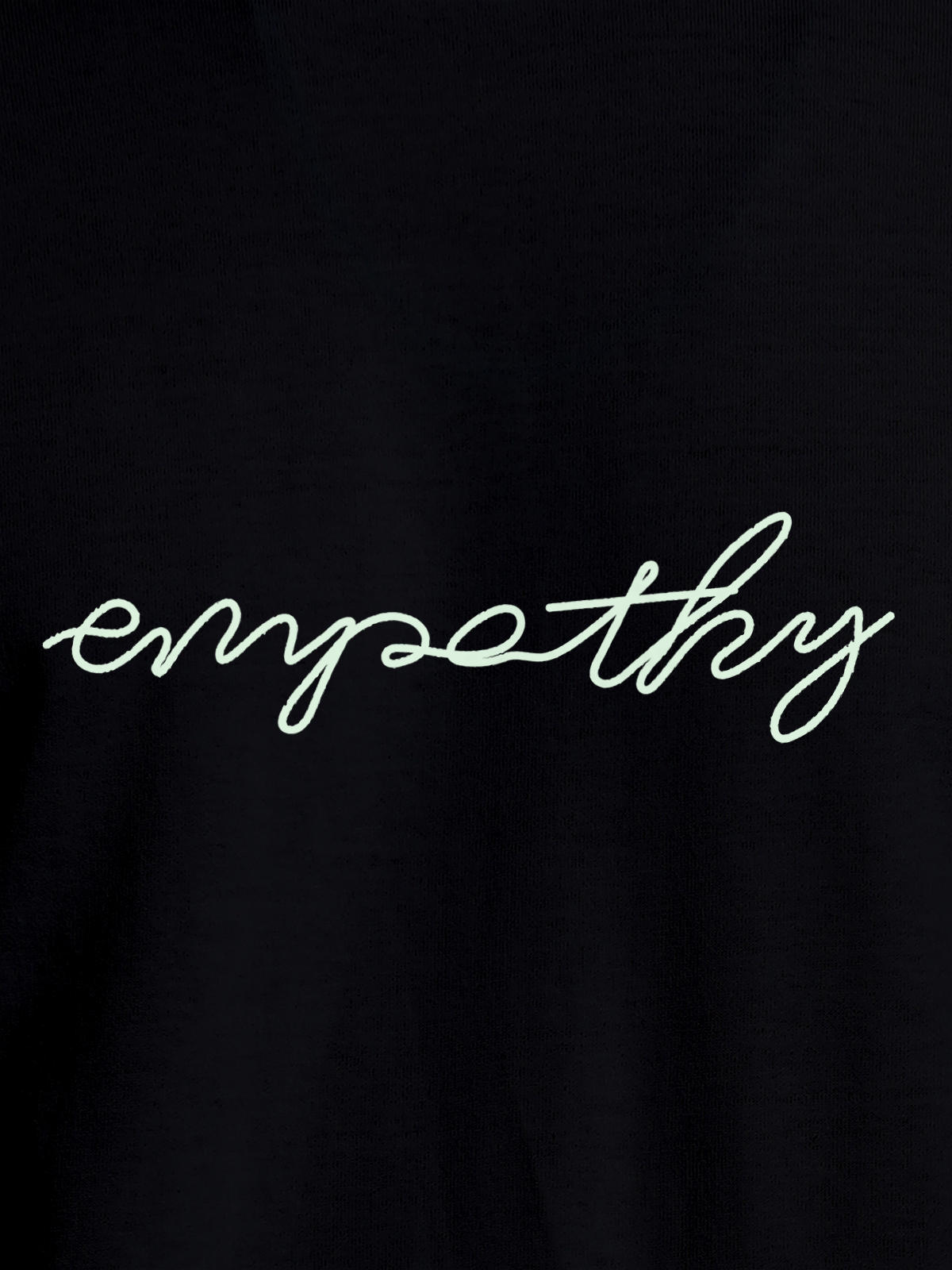 Close up of 'Empathy' design on Men's Black Round Neck T-shirt, highlighting intricate details and vibrant print.