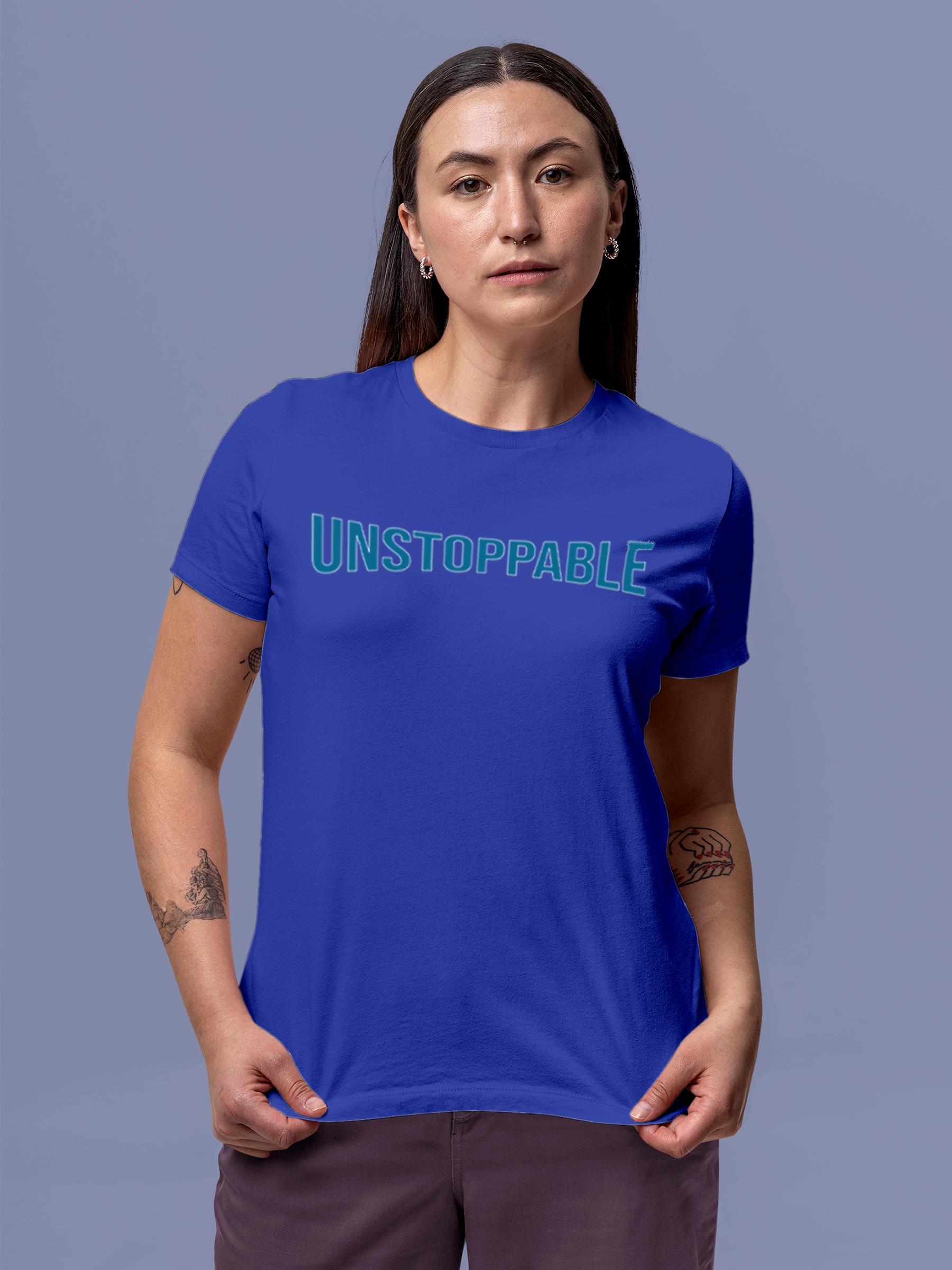 Model wearing Women's Blue Round Neck T-shirt with 'Unstoppable' design, offering effortless style and premium comfort