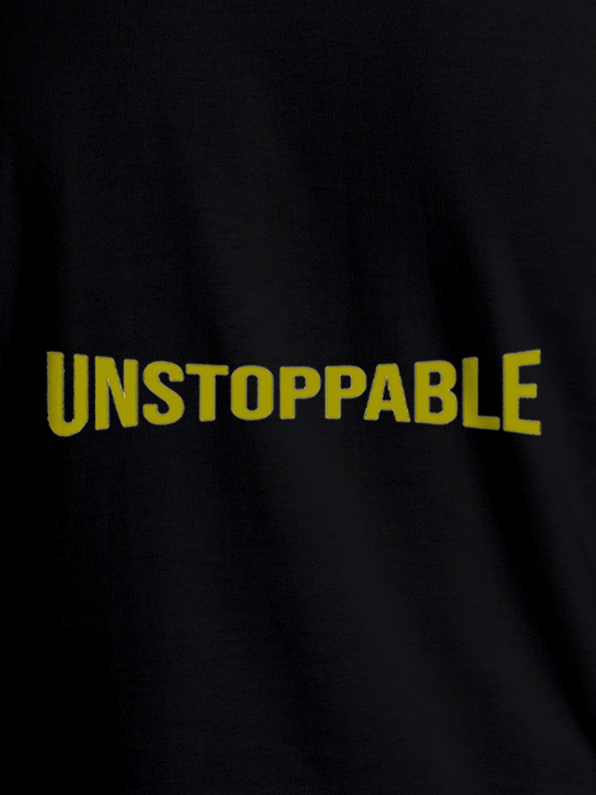 Close up of 'Unstoppable' design on Men's Black Round Neck T-shirt, highlighting intricate details and vibrant print.