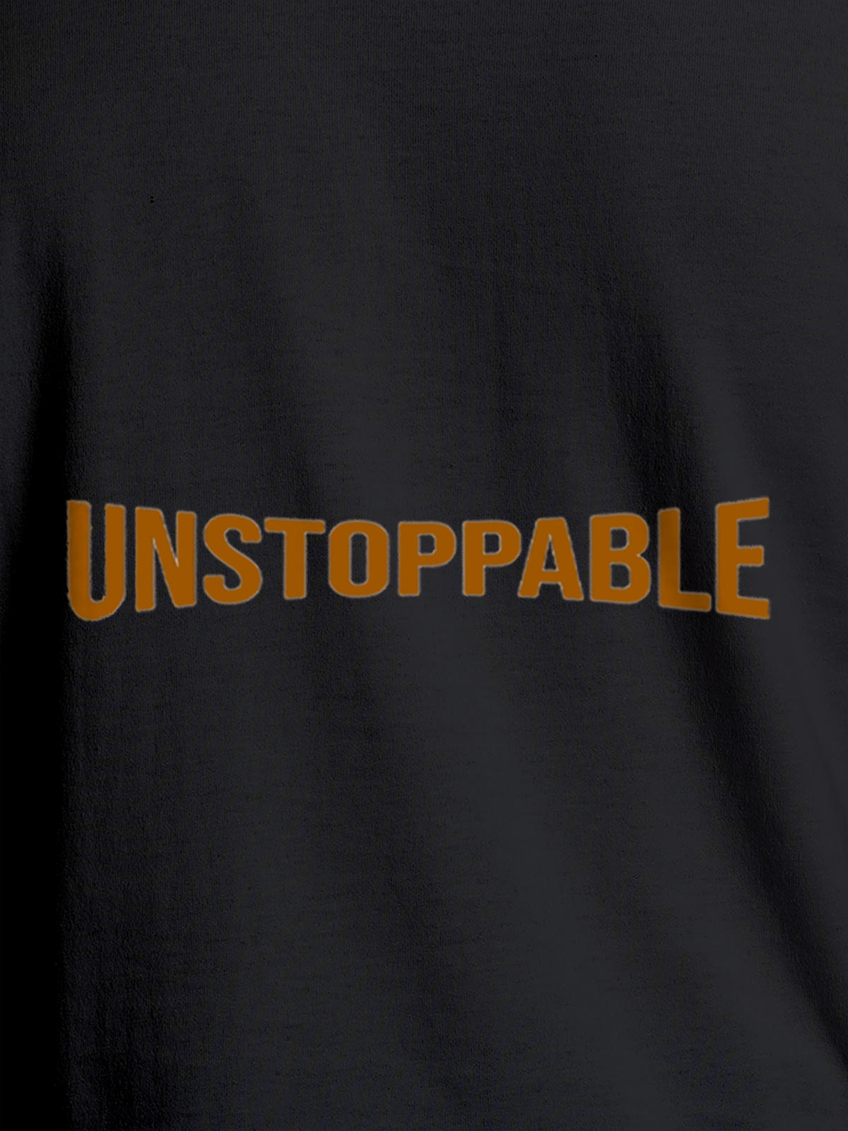 Close up of 'Unstoppable' design on Men's Dark Grey Round Neck T-shirt, highlighting intricate details and vibrant print.