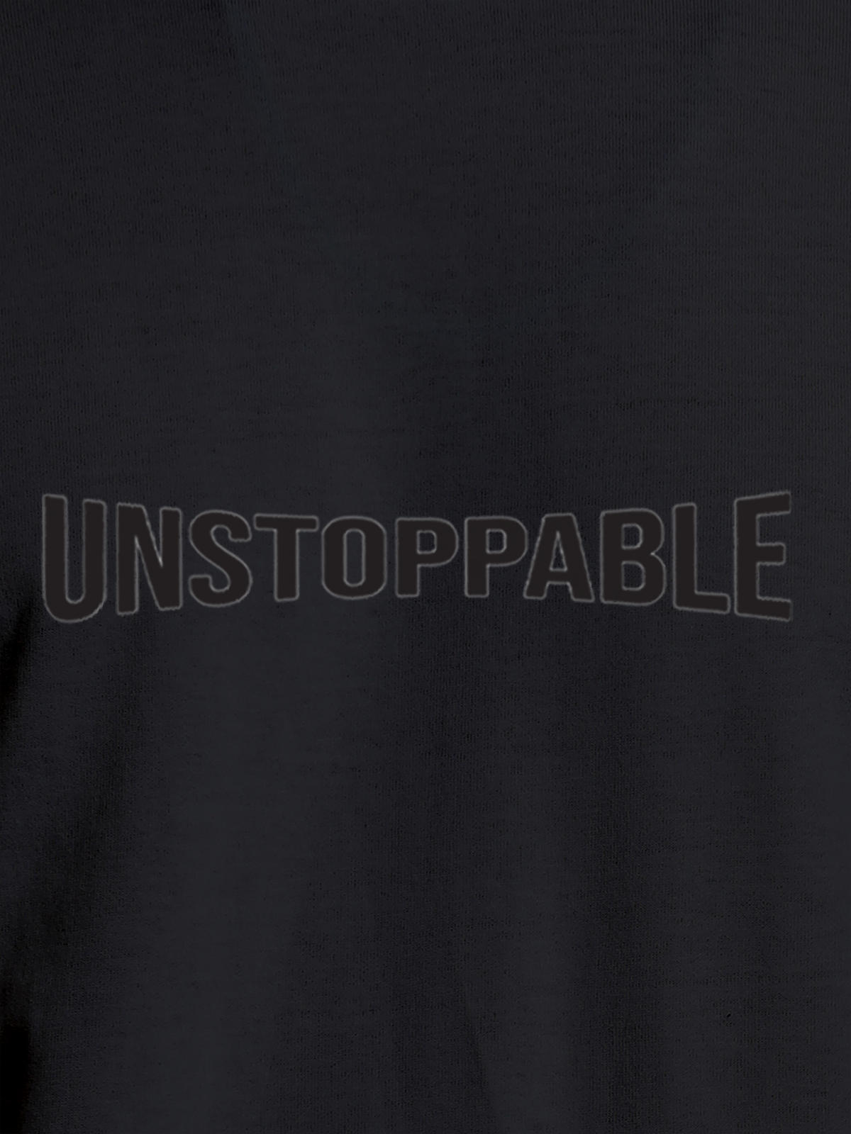 Close up of 'Unstoppable' design on Women's Dark Grey Round Neck T-shirt, highlighting intricate details and vibrant print.