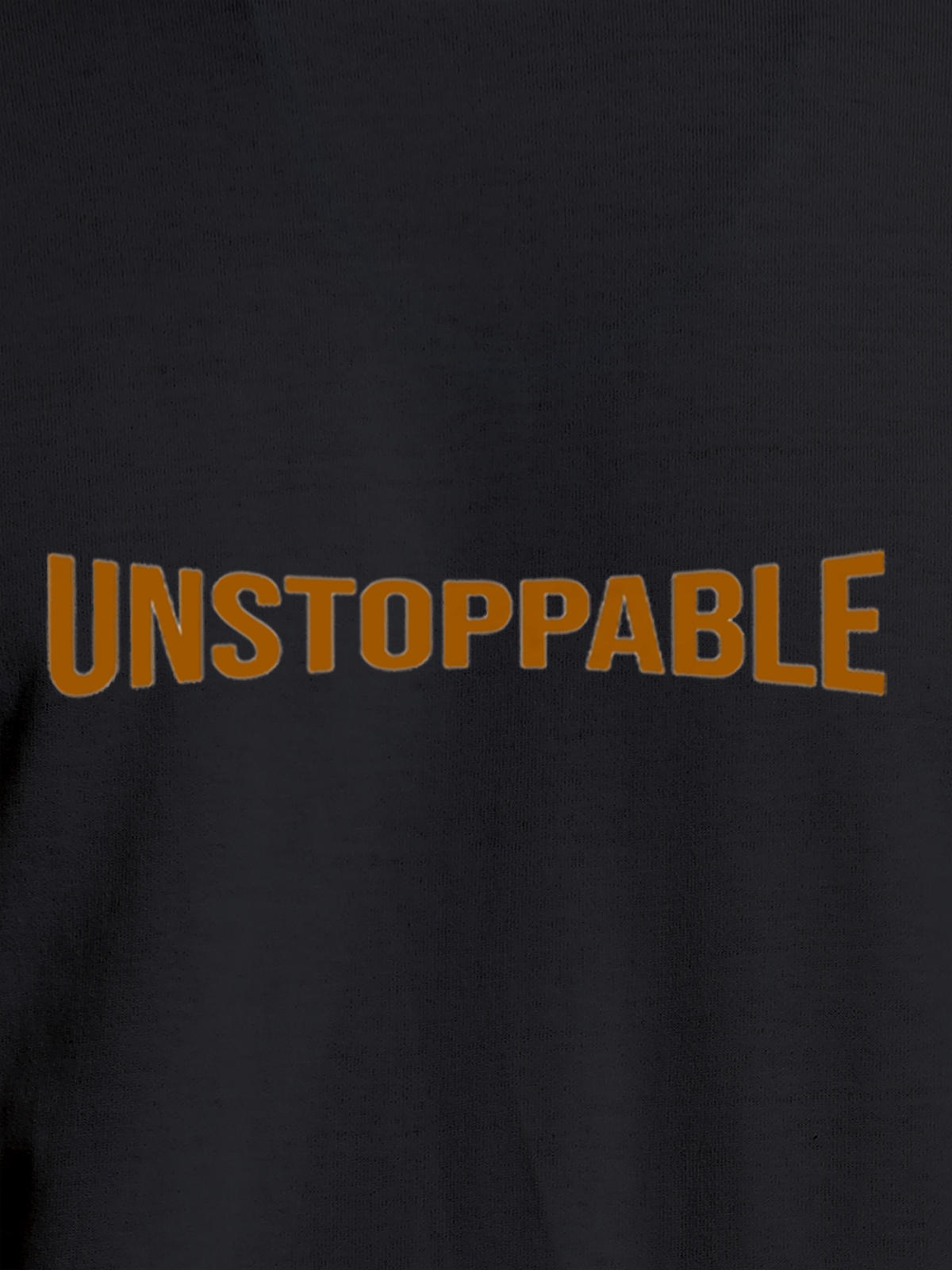 Close up of 'Unstoppable' design on Women's Dark Grey Round Neck T-shirt, highlighting intricate details and vibrant print.