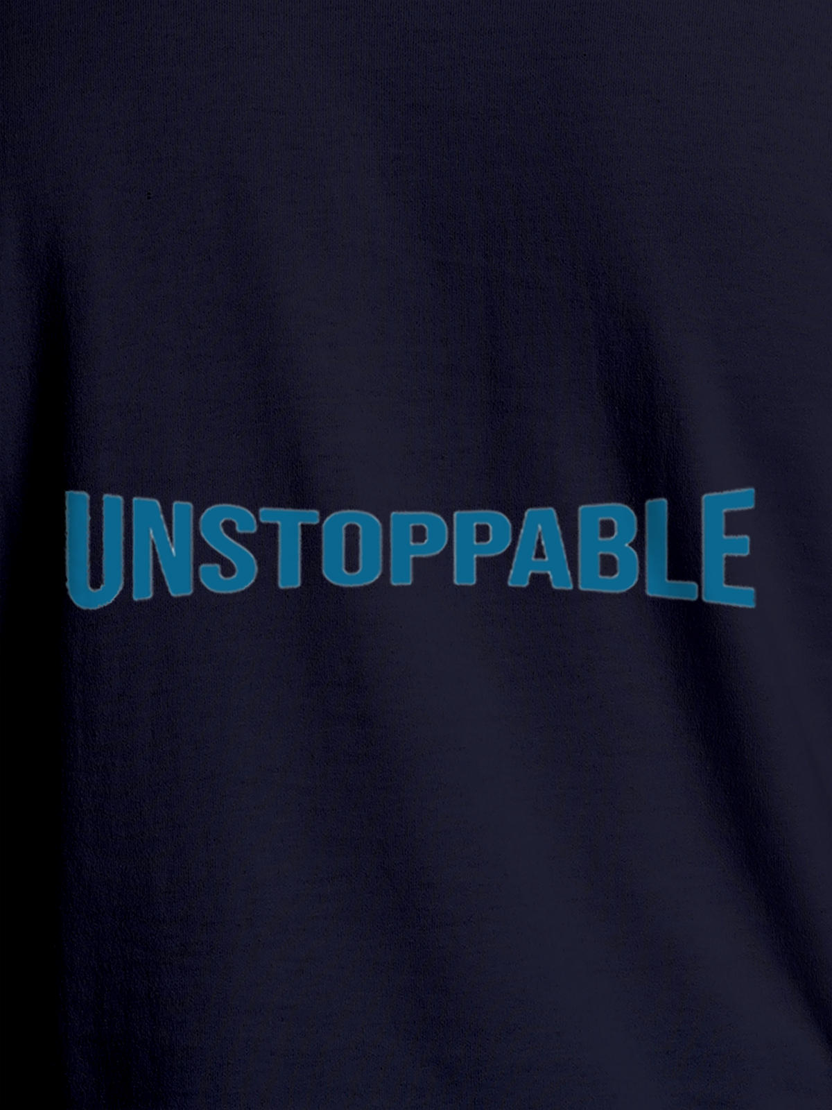 Close up of 'Unstoppable' design on Men's Navy Blue Round Neck T-shirt, highlighting intricate details and vibrant print.