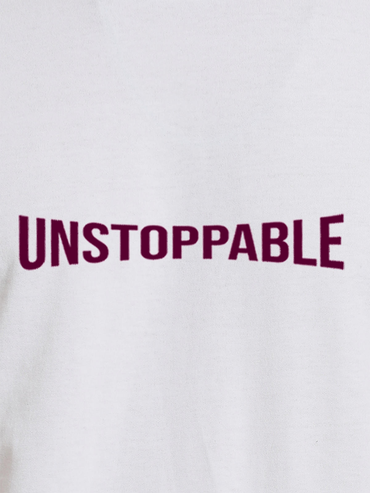 Close up of 'Unstoppable' design on Women's White Round Neck T-shirt, highlighting intricate details and vibrant print.