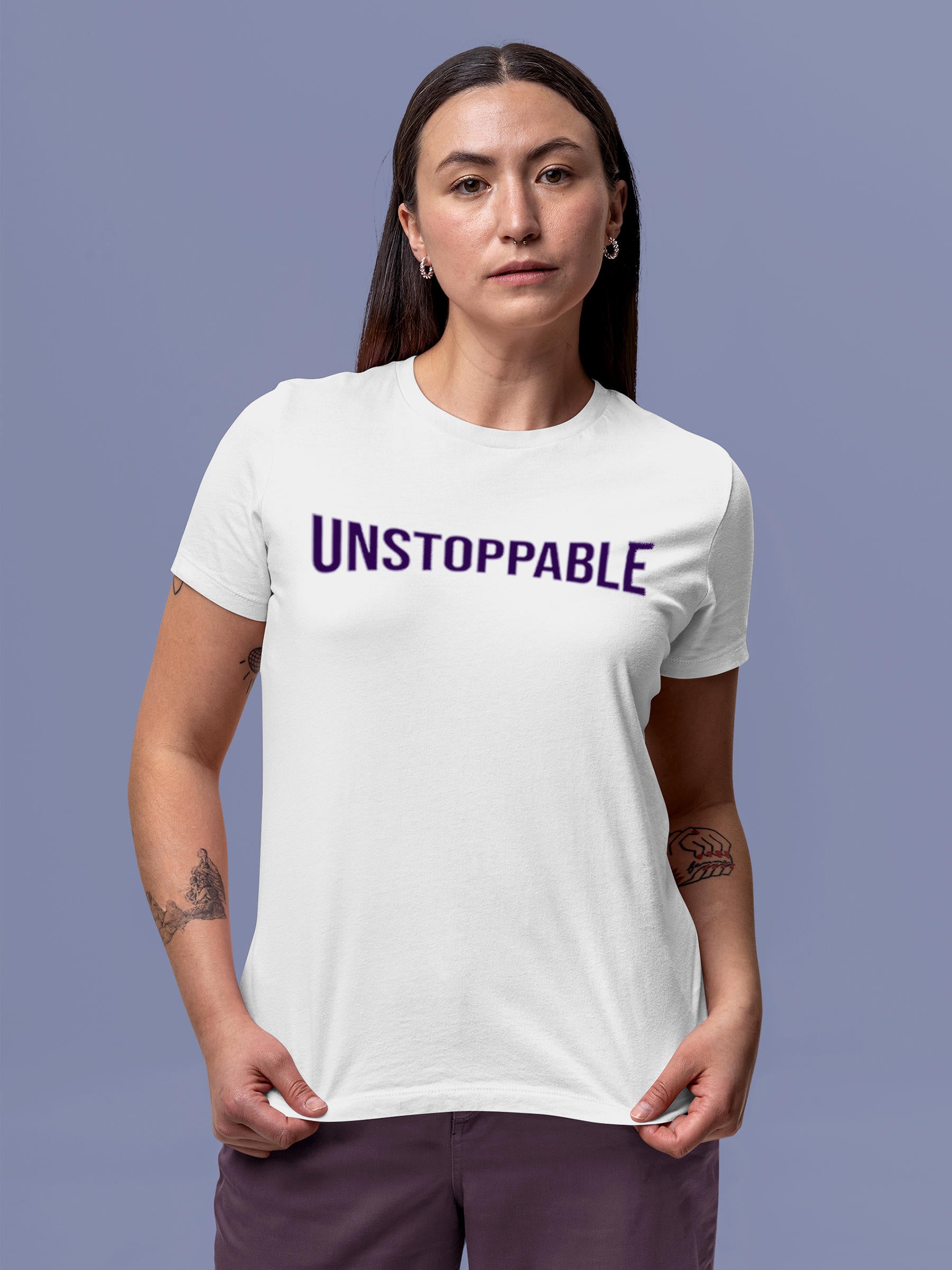 Model wearing Women's White Round Neck T-shirt with 'Unstoppable' design, offering effortless style and premium comfort