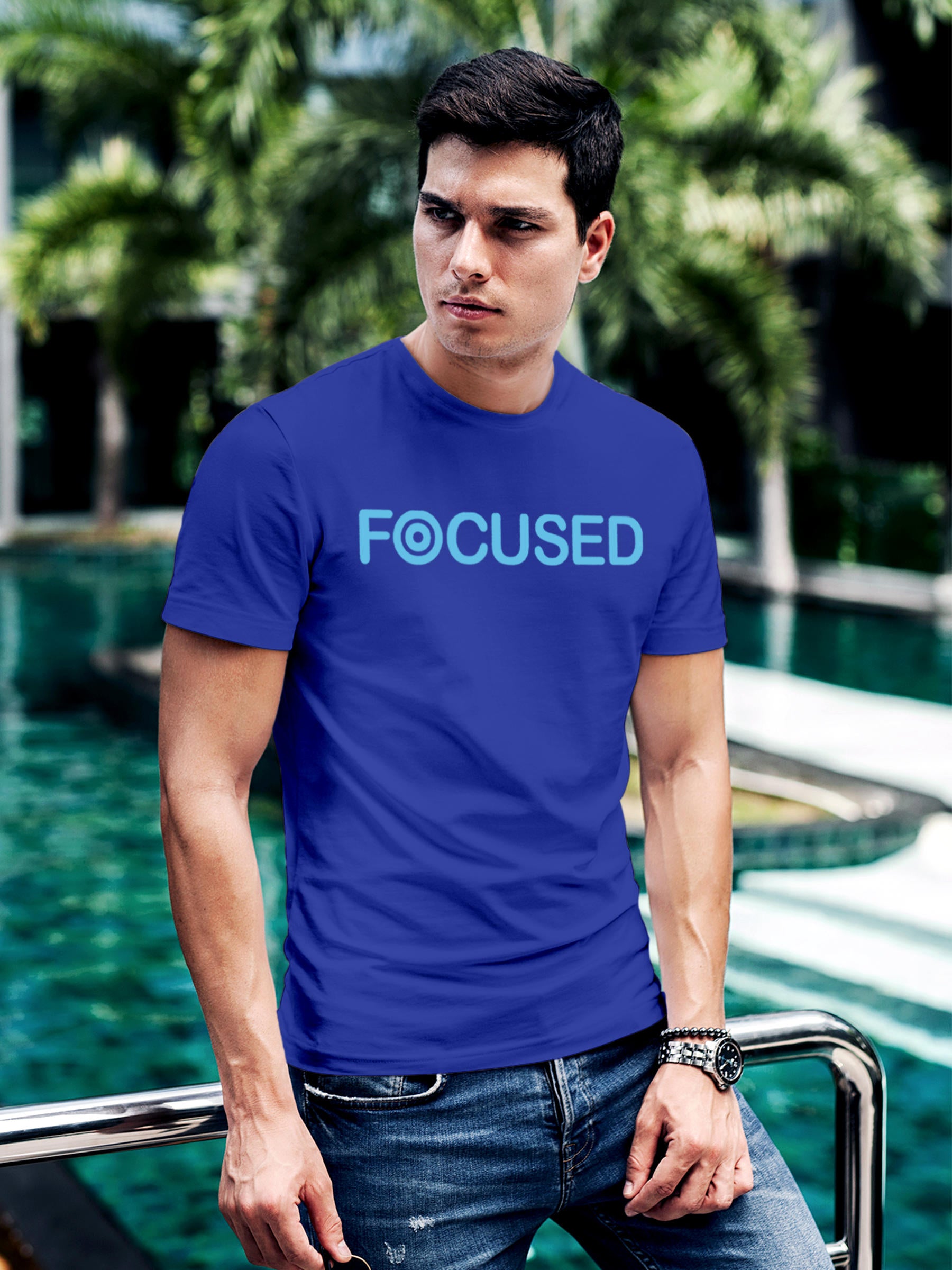 Model wearing Men's Blue Round Neck T-shirt with 'Focused' design, offering effortless style and premium comfort