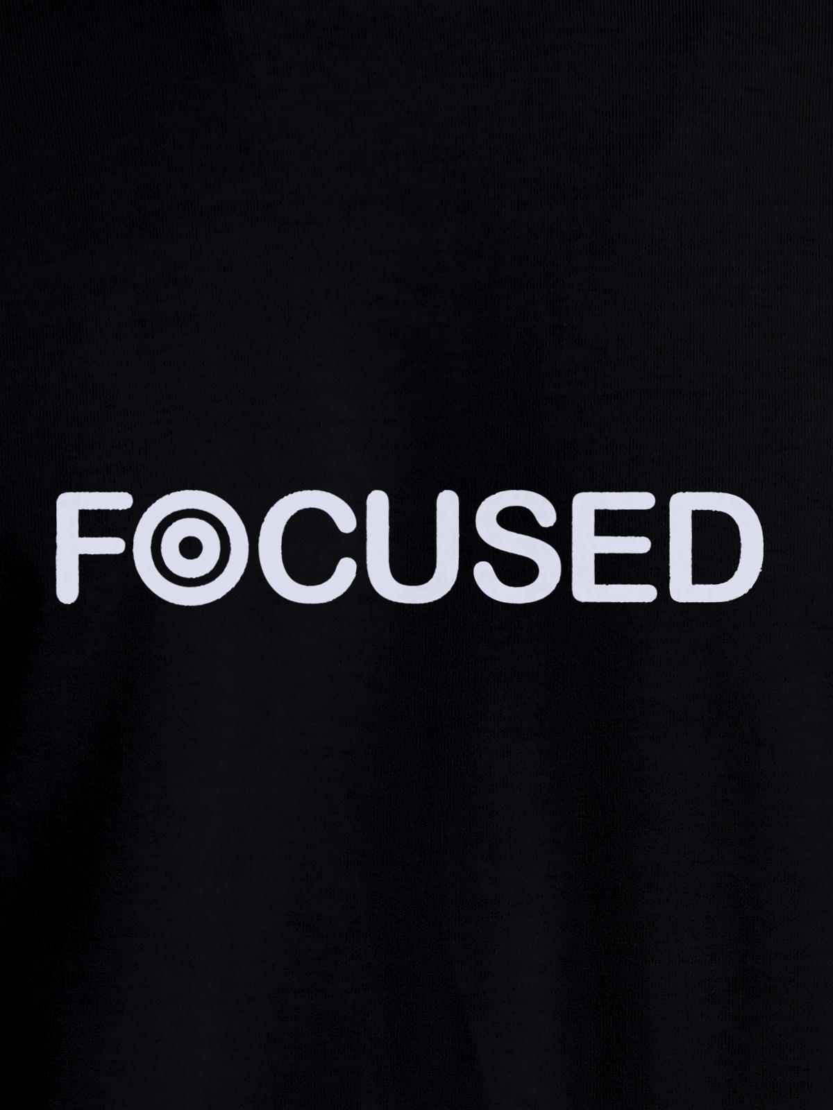 Close up of 'Focused' design on Men's Black Round Neck T-shirt, highlighting intricate details and vibrant print.