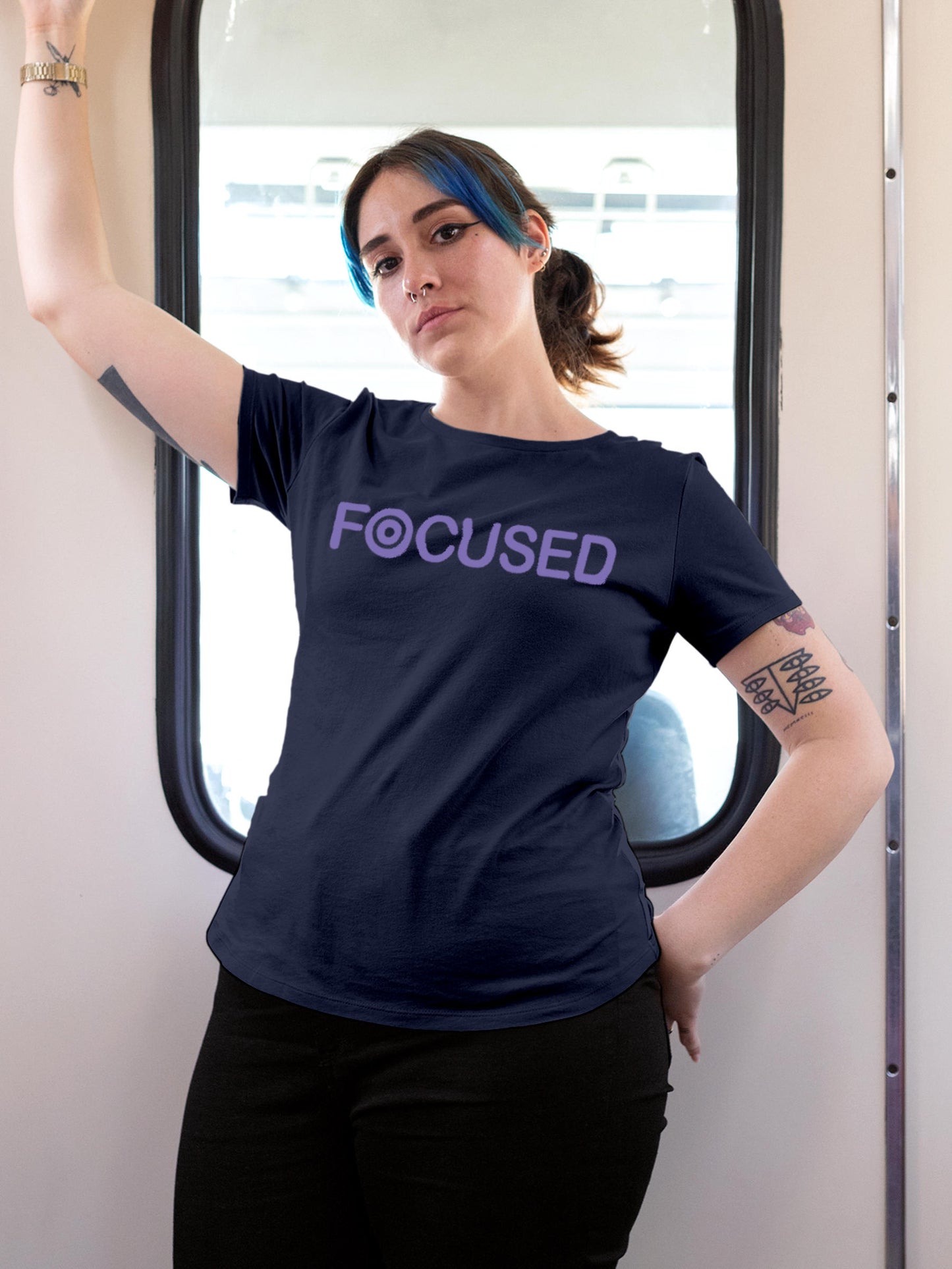 Model wearing Women's Navy Blue Round Neck T-shirt with 'Focused' design, offering effortless style and premium comfort