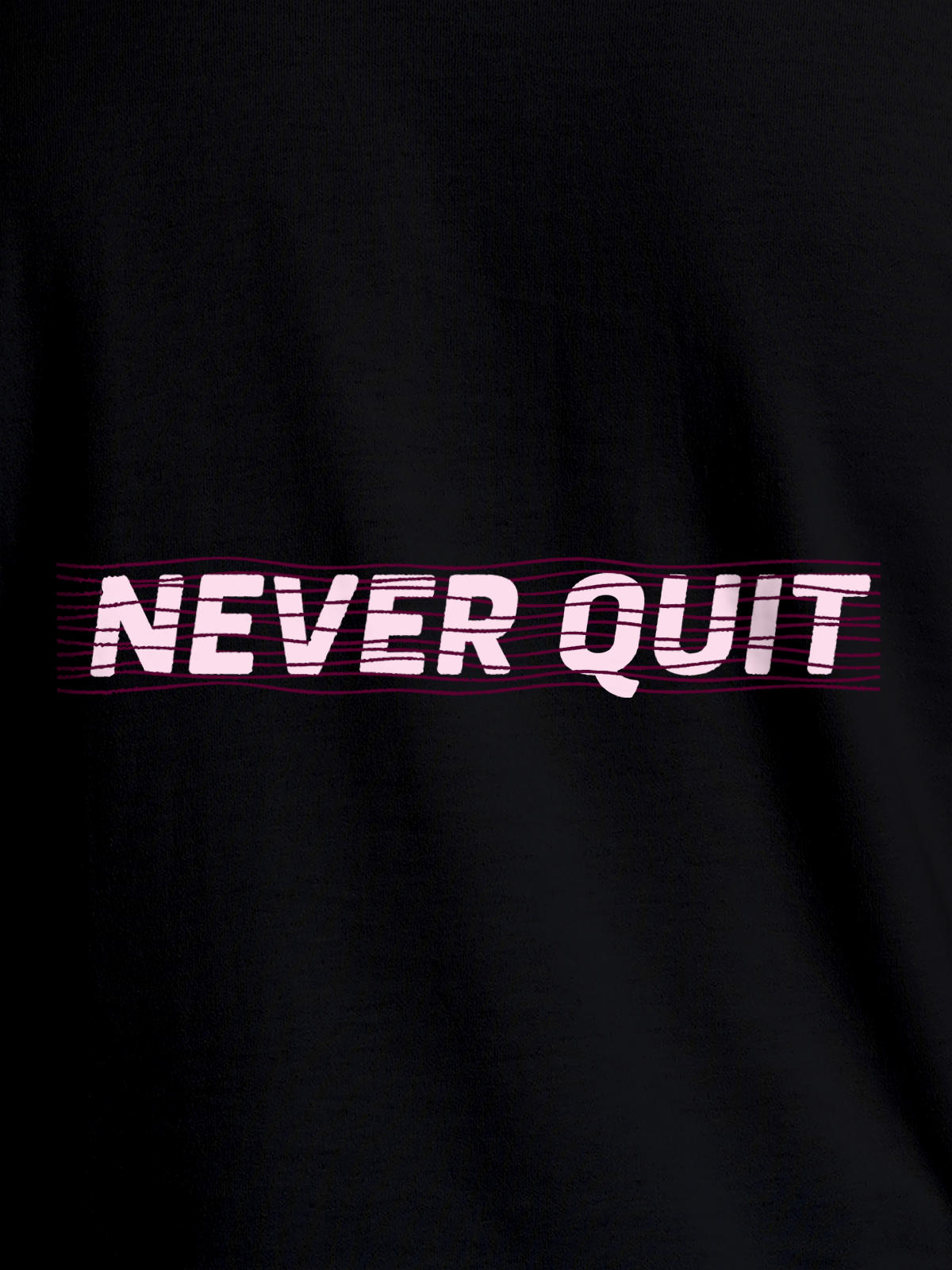 Close up of 'Never Quit' design on Women's Black Round Neck T-shirt, highlighting intricate details and vibrant print.