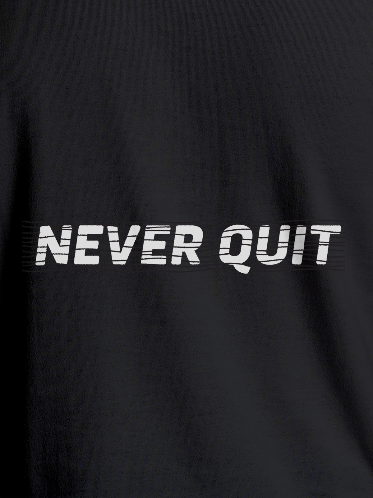 Close up of 'Never Quit' design on Women's Dark Grey Round Neck T-shirt, highlighting intricate details and vibrant print.