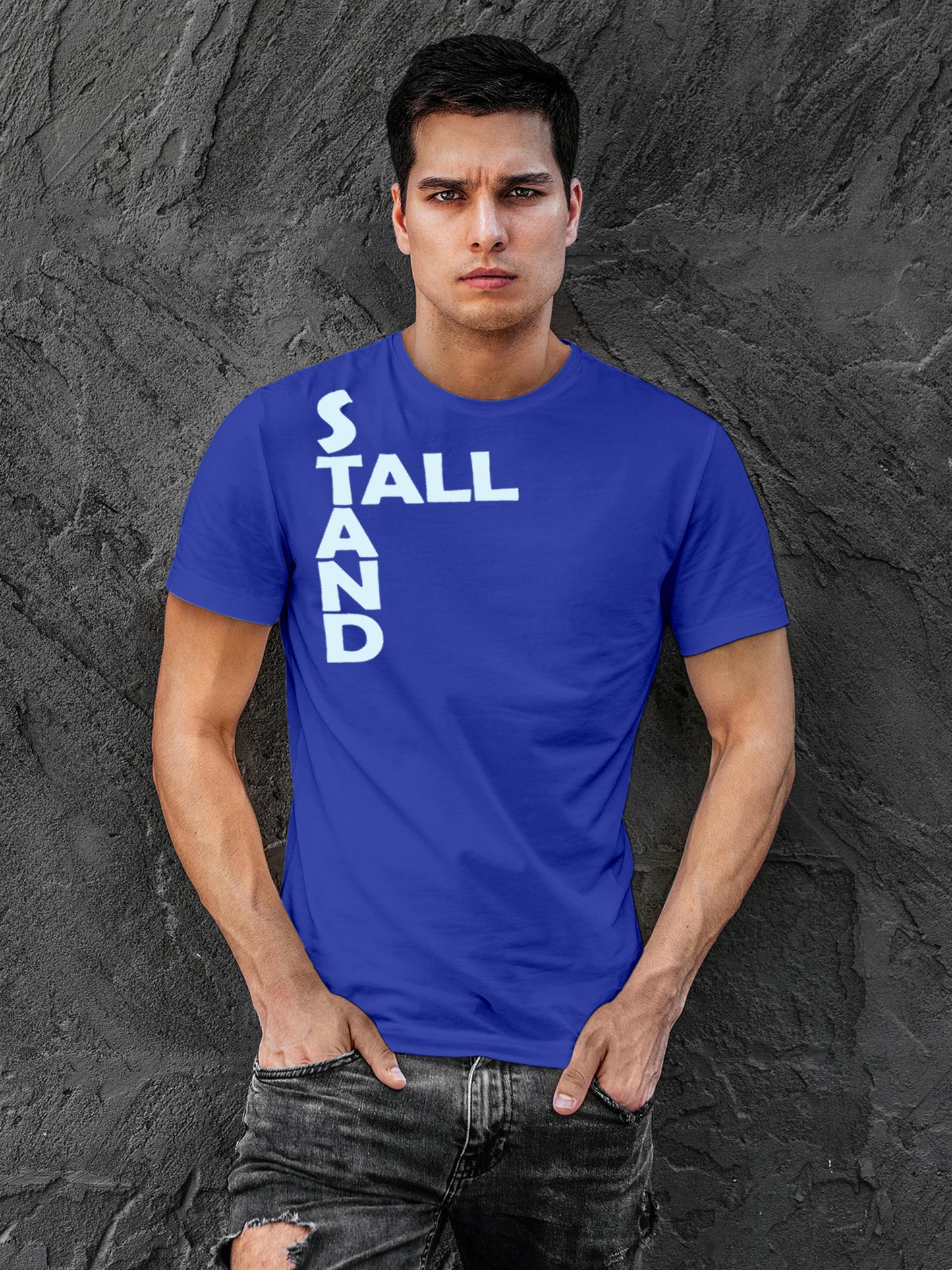 Model wearing Men's Blue Round Neck T-shirt with 'Stand Tall' design, offering effortless style and premium comfort