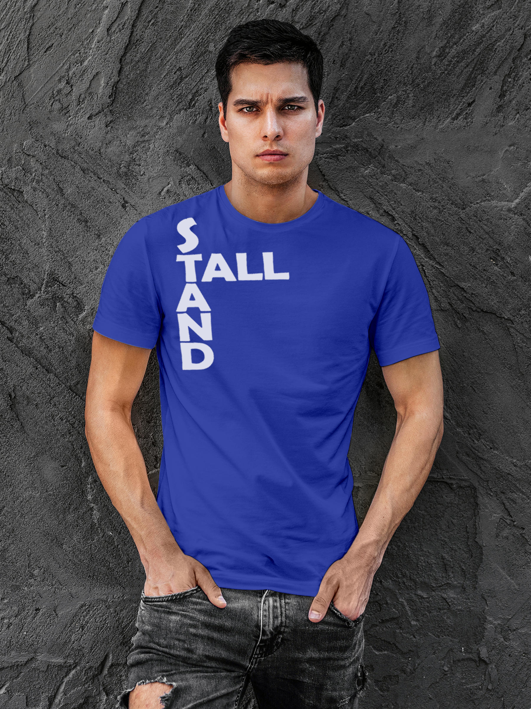 Model wearing Men's Blue Round Neck T-shirt with 'Stand Tall' design, offering effortless style and premium comfort