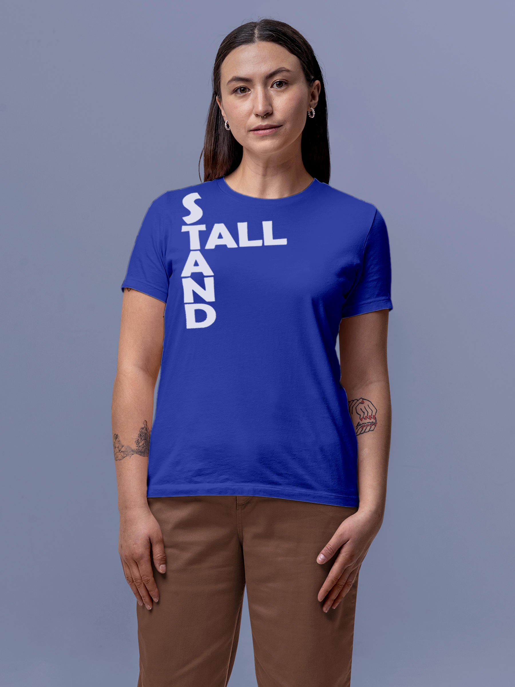 Model wearing Women's Blue Round Neck T-shirt with 'Stand Tall' design, offering effortless style and premium comfort