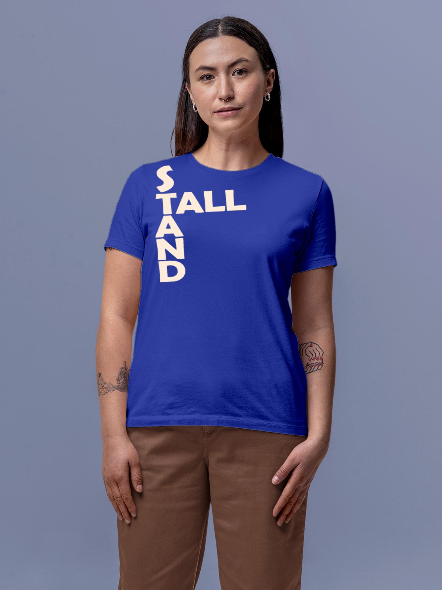 Model wearing Women's Blue Round Neck T-shirt with 'Stand Tall' design, offering effortless style and premium comfort