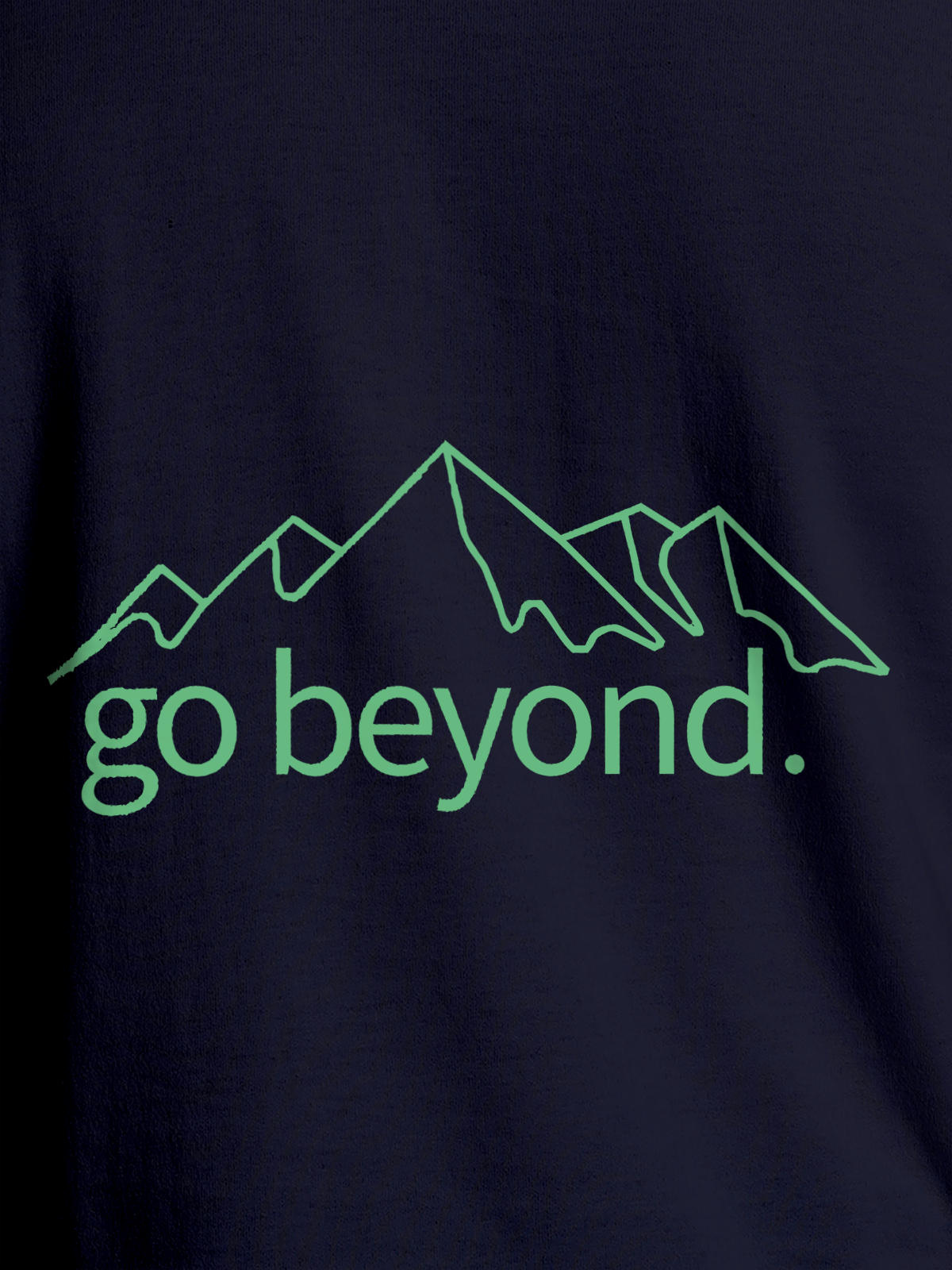 Close up of 'Go Beyond' design on Men's Navy Blue Round Neck T-shirt, highlighting intricate details and vibrant print.