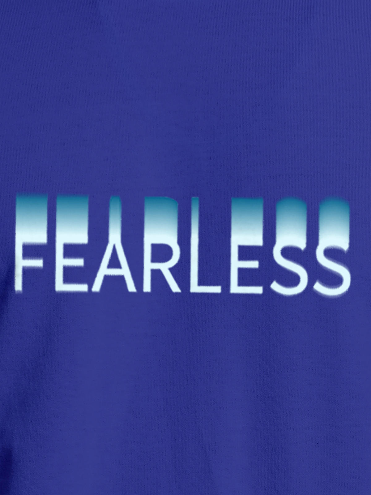 Close up of 'Fearless' design on Men's Blue Round Neck T-shirt, highlighting intricate details and vibrant print.
