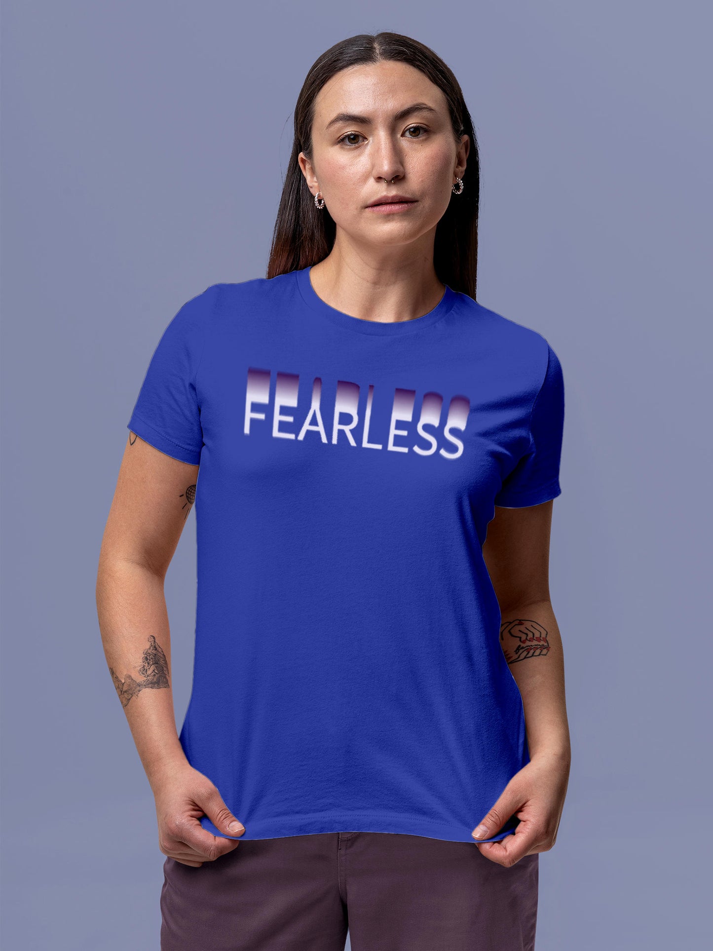 Model wearing Women's Blue Round Neck T-shirt with 'Fearless' design, offering effortless style and premium comfort