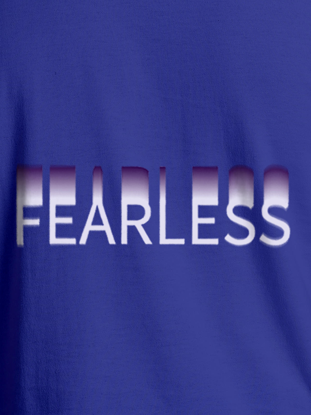 Close up of 'Fearless' design on Women's Blue Round Neck T-shirt, highlighting intricate details and vibrant print.