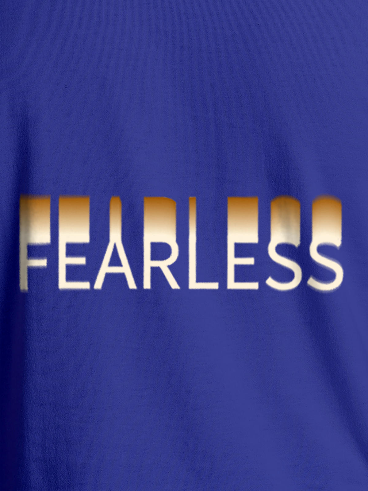 Close up of 'Fearless' design on Women's Blue Round Neck T-shirt, highlighting intricate details and vibrant print.