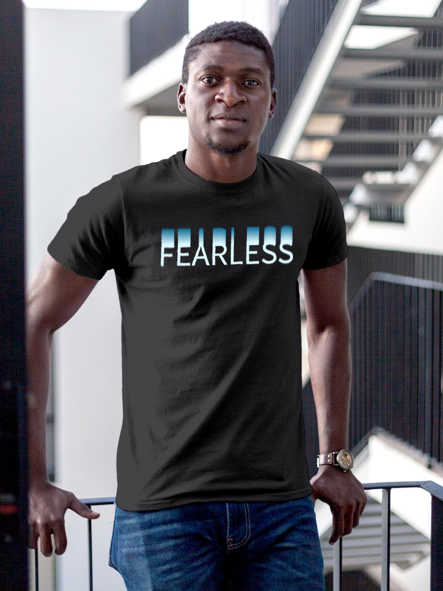 Model wearing Men's Dark Grey Round Neck T-shirt with 'Fearless' design, offering effortless style and premium comfort