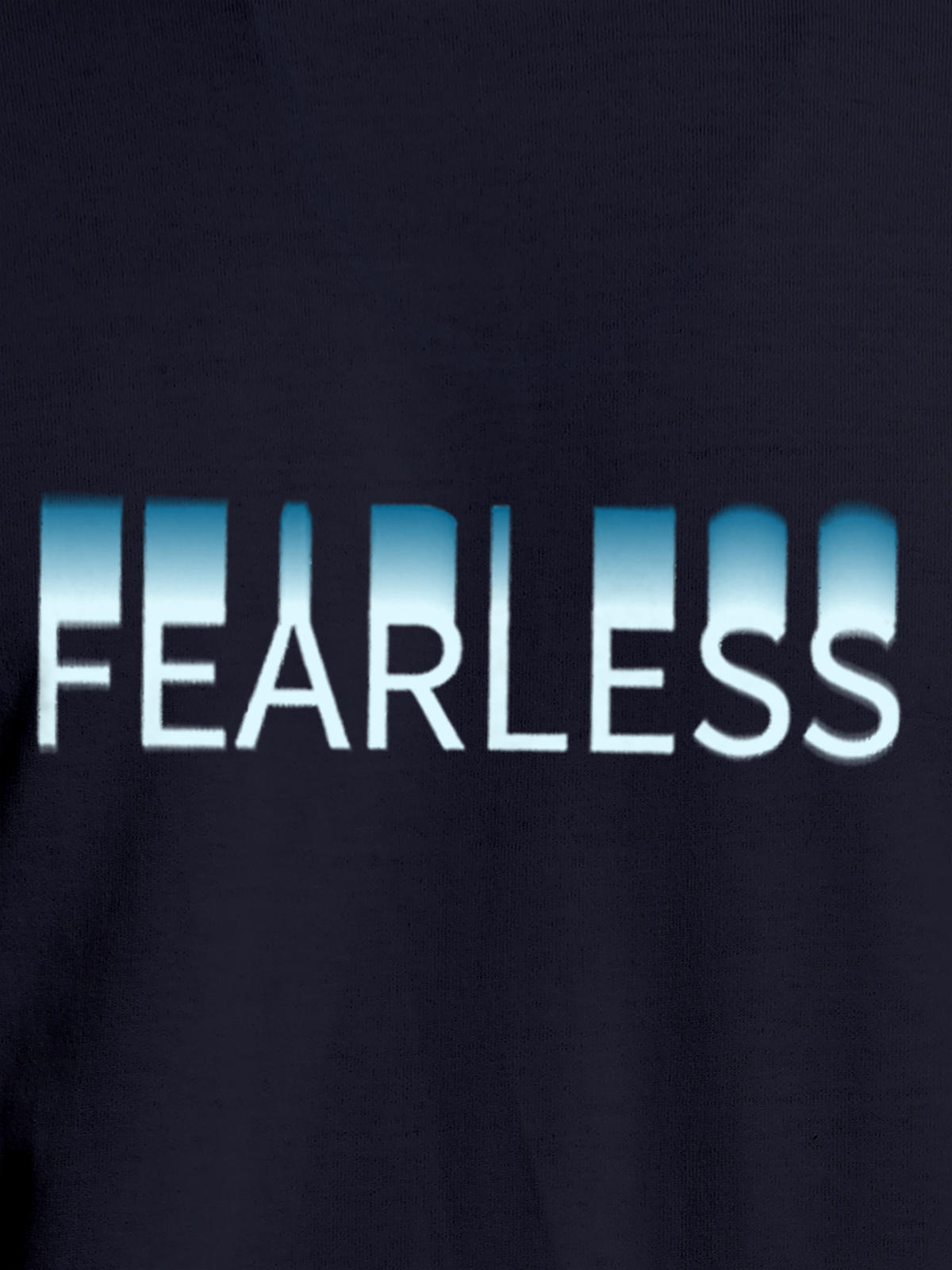 Close up of 'Fearless' design on Men's Navy Blue Round Neck T-shirt, highlighting intricate details and vibrant print.