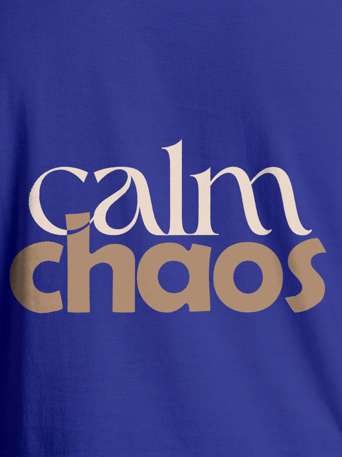 Close up of 'Calm Chaos' design on Women's Blue Round Neck T-shirt, highlighting intricate details and vibrant print.