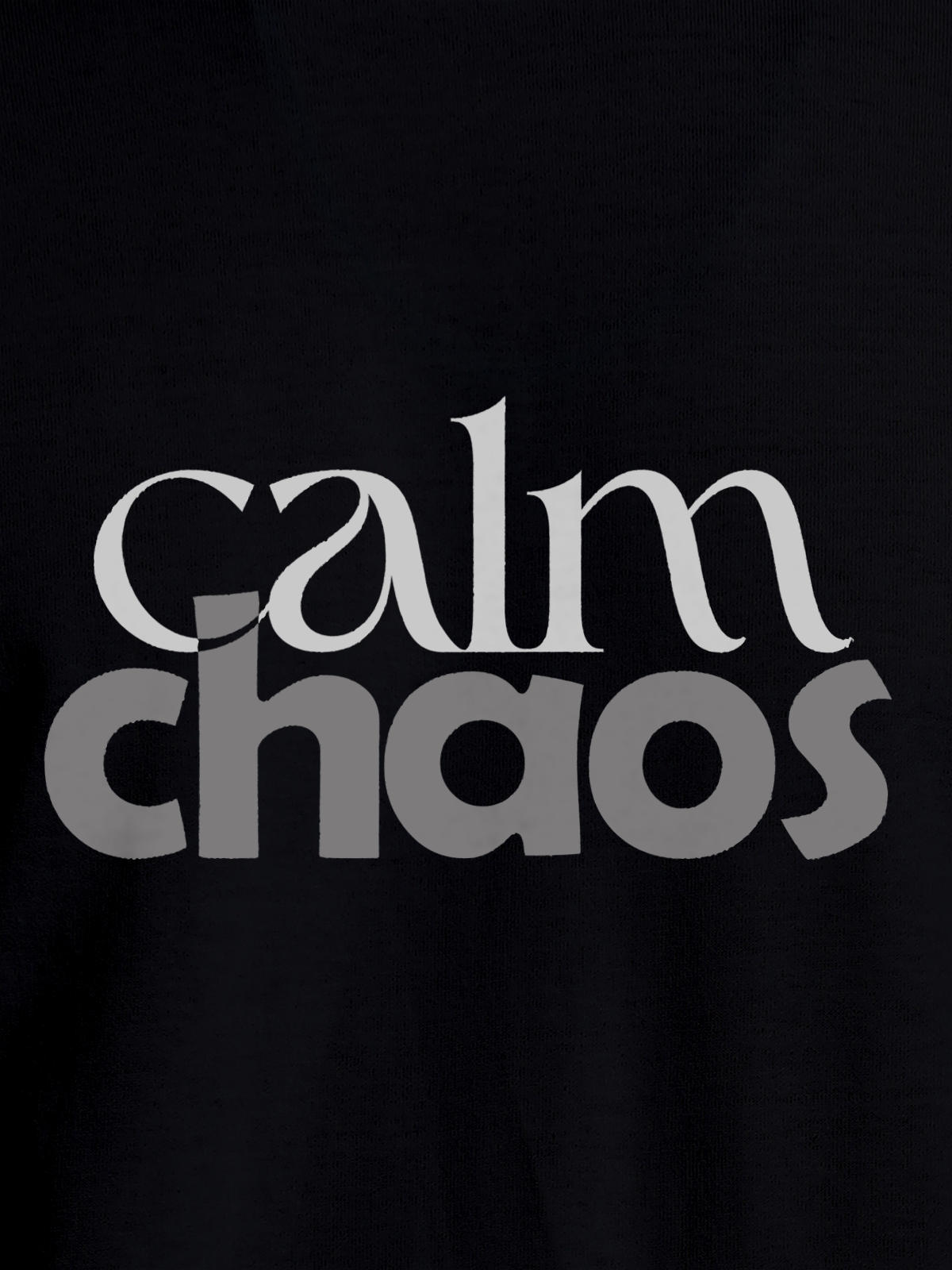 Close up of 'Calm Chaos' design on Men's Black Round Neck T-shirt, highlighting intricate details and vibrant print.