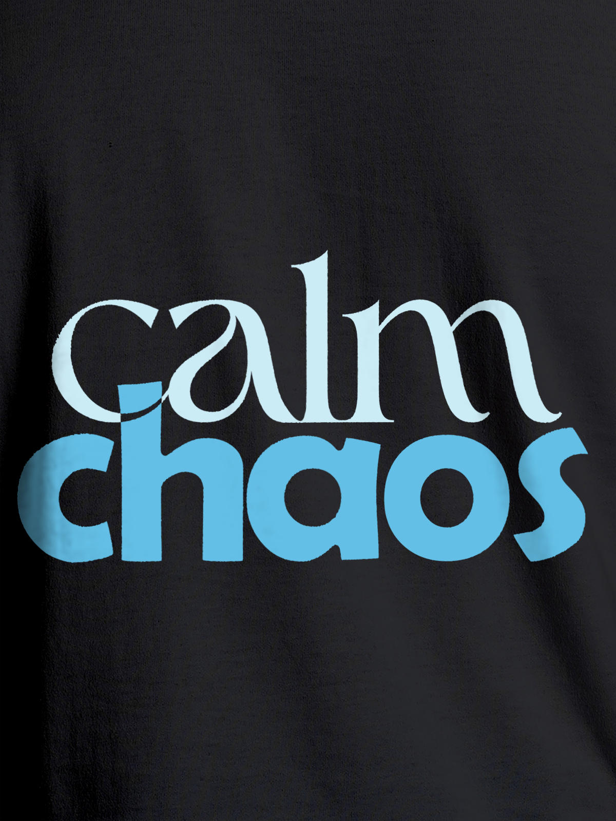 Close up of 'Calm Chaos' design on Women's Dark Grey Round Neck T-shirt, highlighting intricate details and vibrant print.